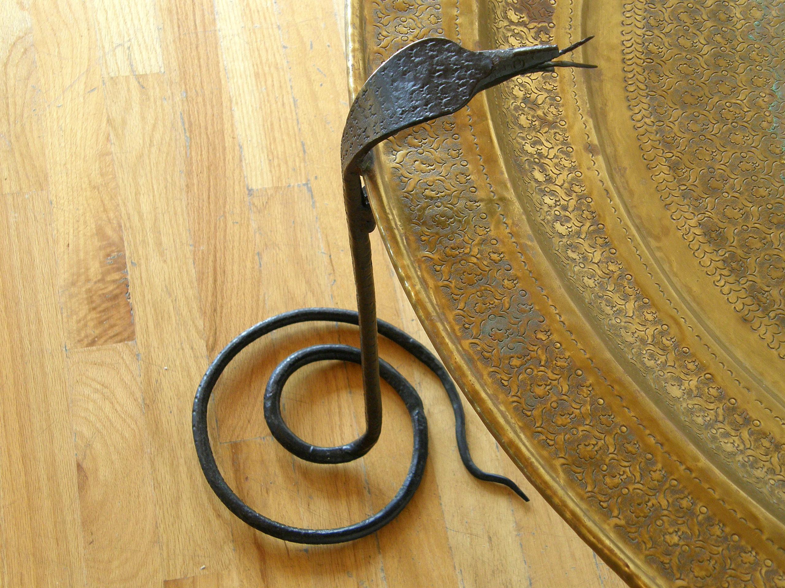 Mid-20th Century Wrought Iron Serpents Table with Hand Tooled Star Pattern on Brass Top For Sale