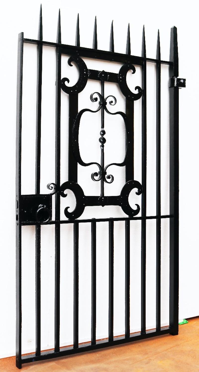 This refurbished antique pedestrian gate is made from wrought iron. The hinges can be modified to your required specification at additional cost.

 