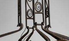 Lustre en fer forgé et verre teinté d'Henri Fournet, France, vers 1930