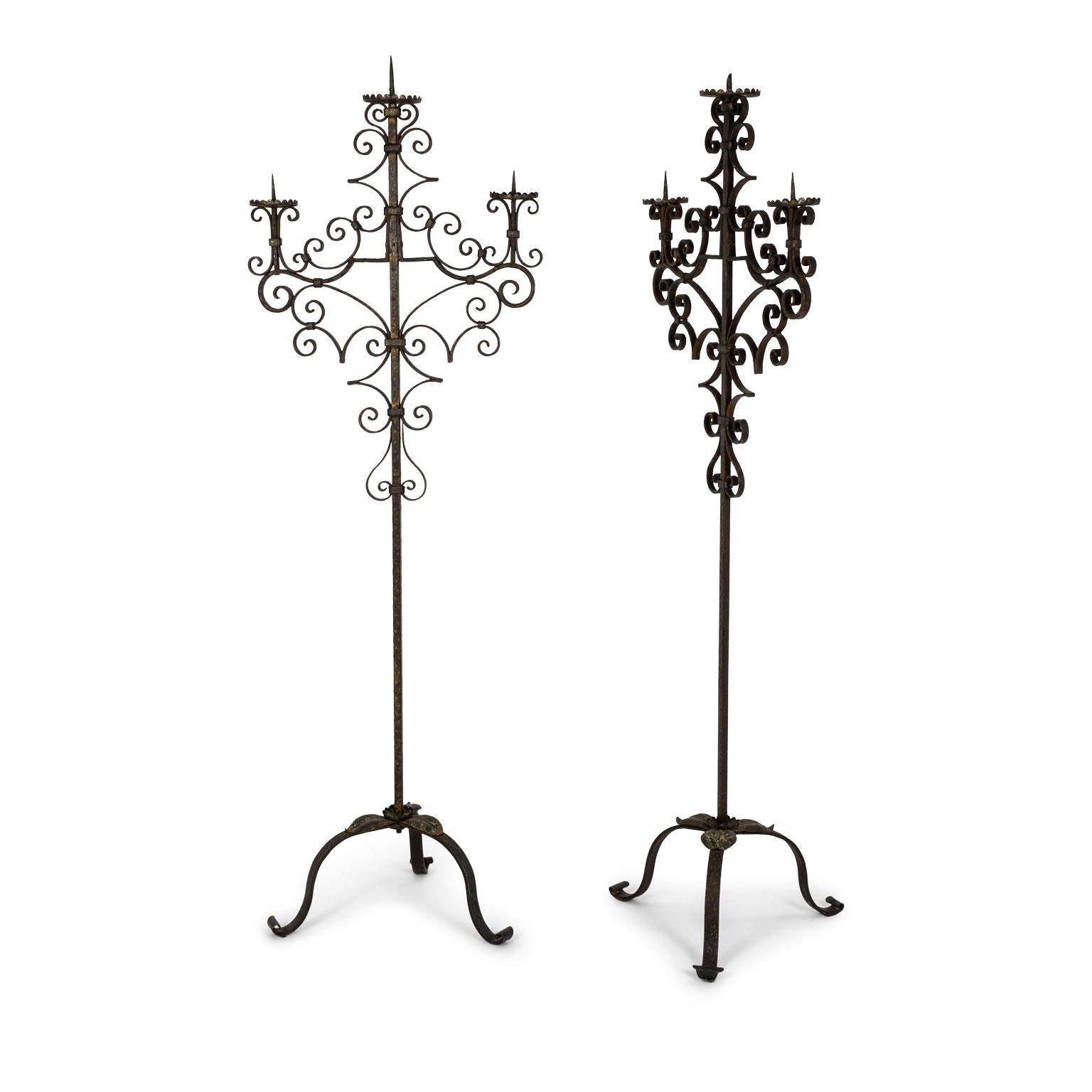 Standing wrought iron standing candelabrum from France, circa 1920-1940. Sold separately and priced $1,700 each.