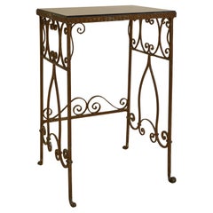 Dekorativer schmiedeeiserner Tisch mit Steinplatte C 1930