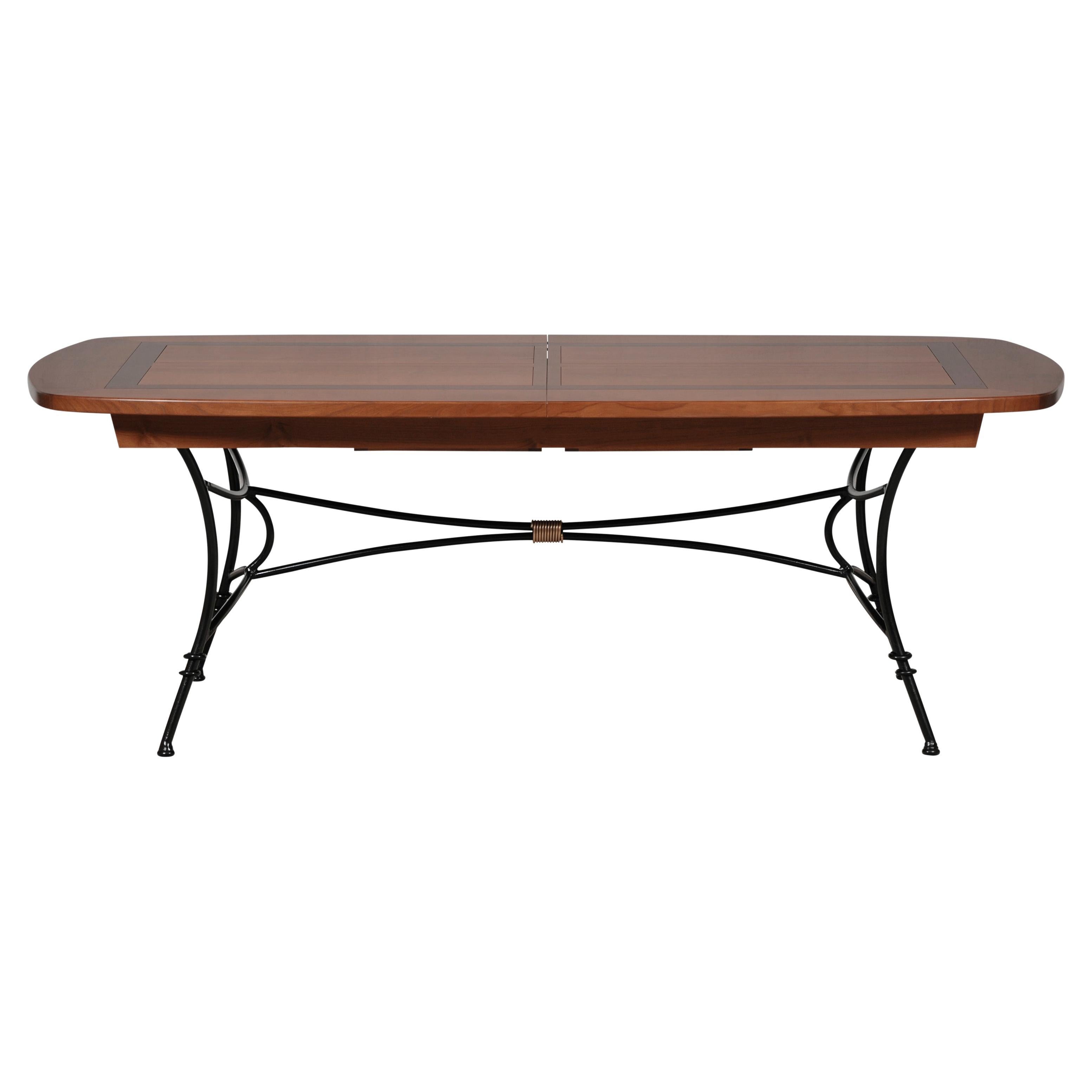 Wrought-iron table with solid cherry top - integrated extensions