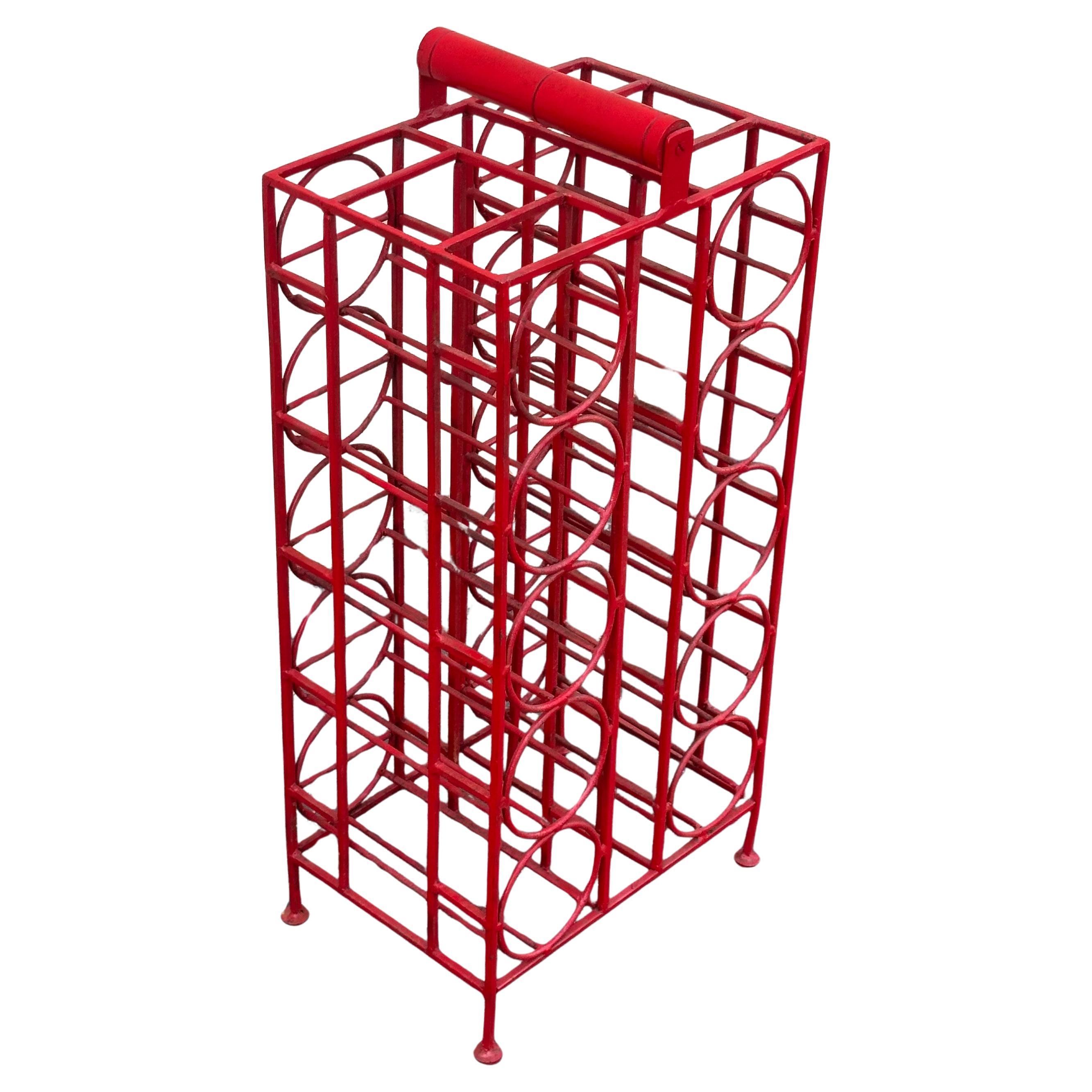 Super cool and hard to find vintage wrought iron ten bottle wine rack by Arthur Umanoff, circa 1950s.  The tower unit measures 12.5