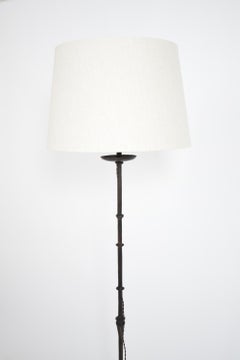 Lampadaire tripode en fer forgé, C.I.C.