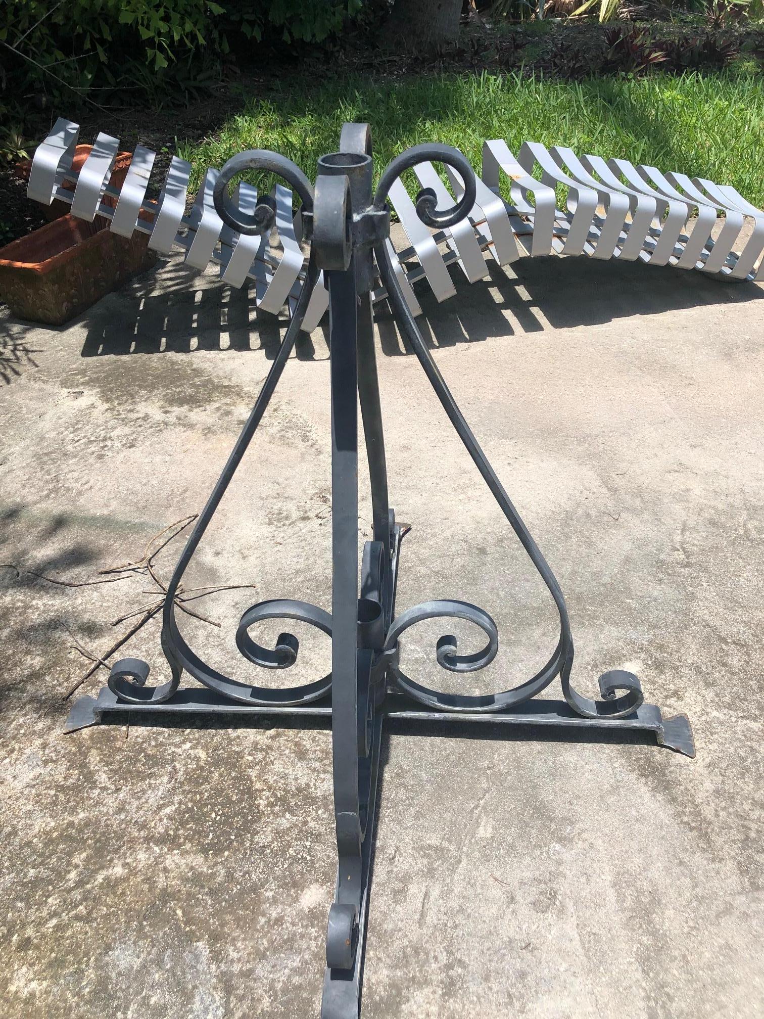 This stylish iron umbrella holder dates to the 1920s-1920s, and is attributued to Addison Mizner.  The piece was acquired from an estated in the Palm Beaches.

Note: The diameter of the opening is 1.57