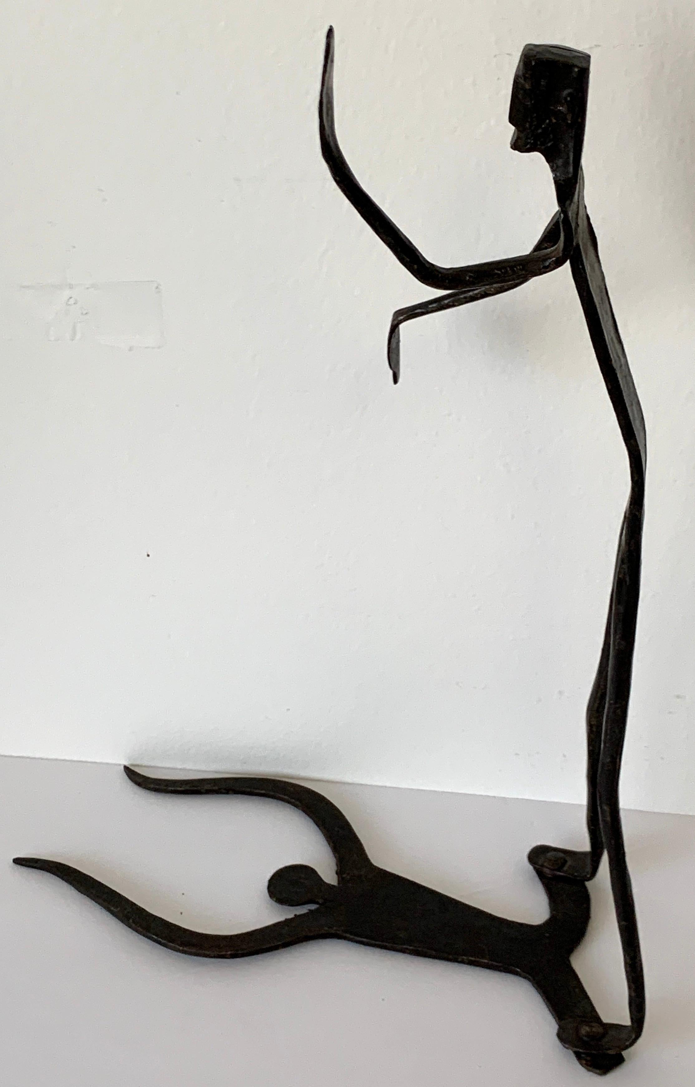 Wrought Iron Walking Man and Shadow Bookends For Sale 2