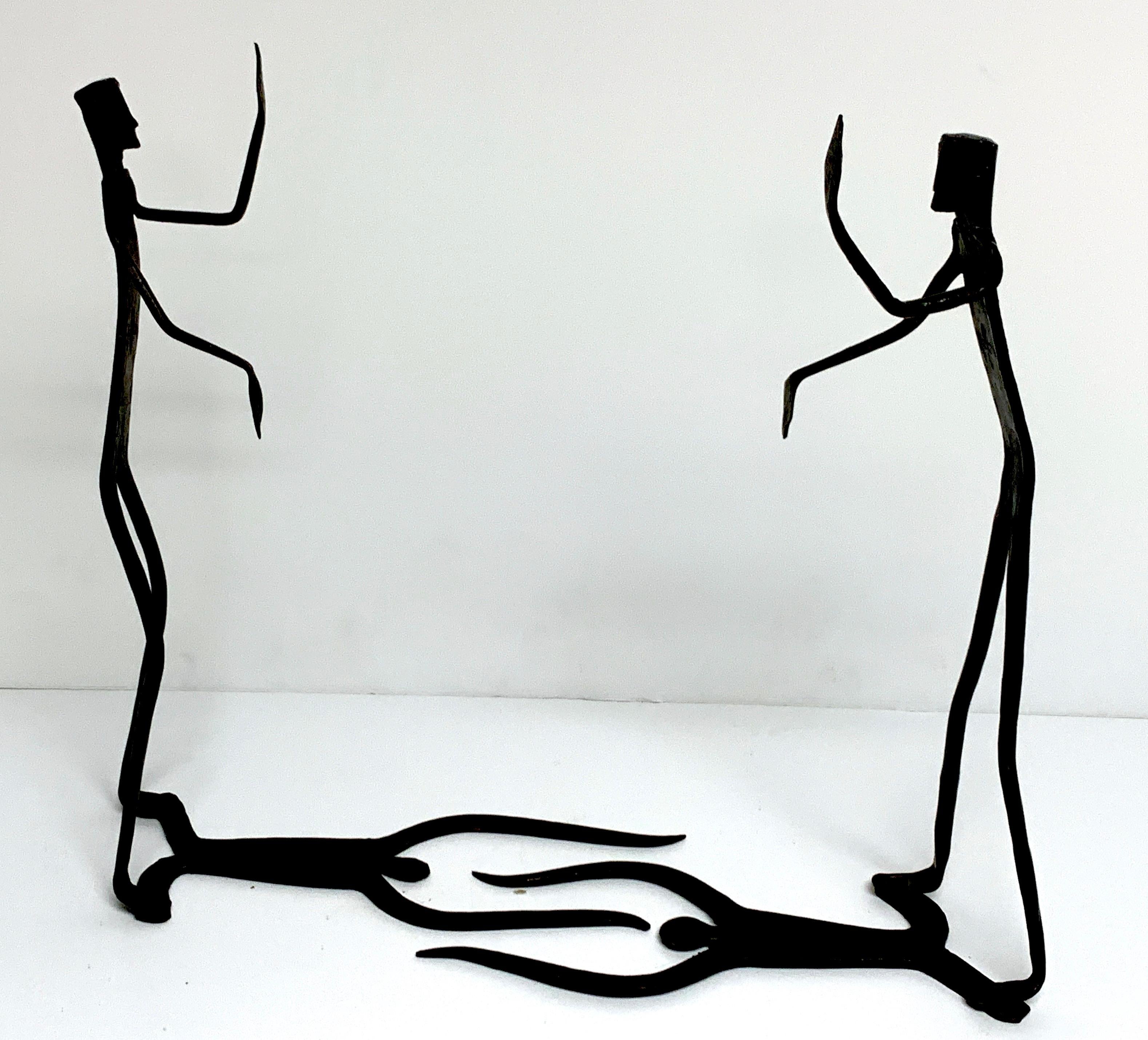 Forged Wrought Iron Walking Man and Shadow Bookends For Sale