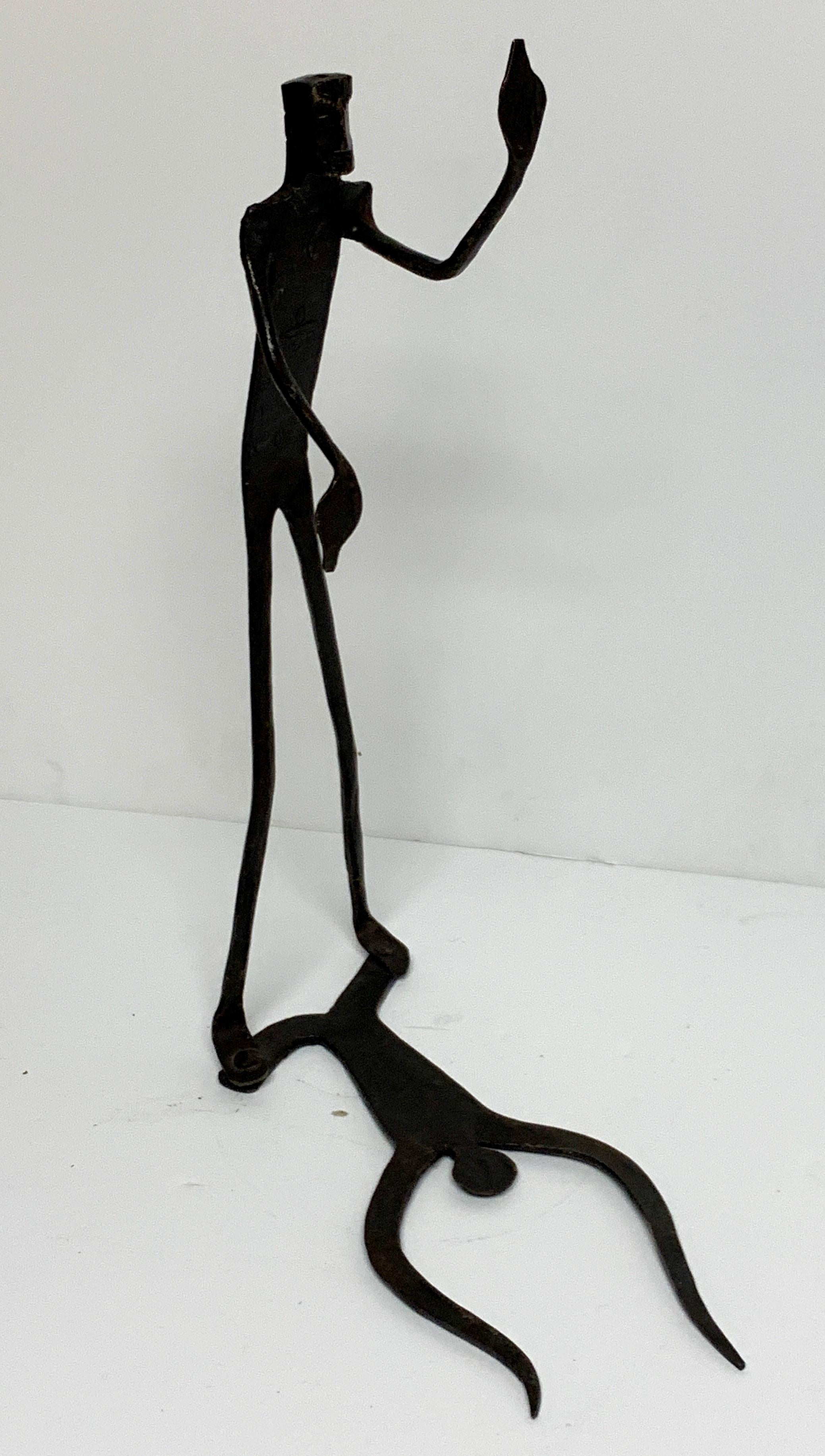 Wrought Iron Walking Man and Shadow Bookends In Good Condition For Sale In West Palm Beach, FL