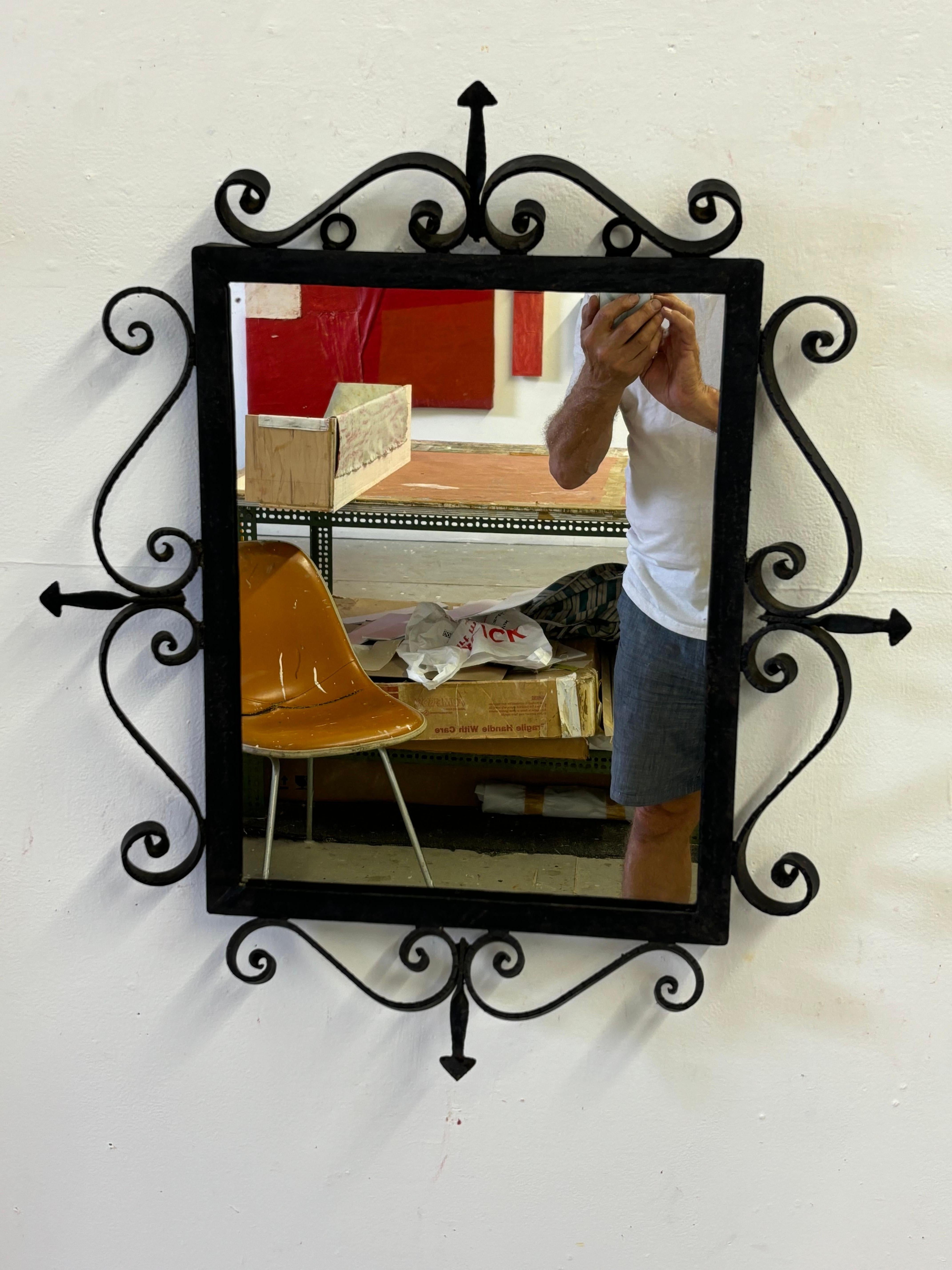 Milieu du XXe siècle Miroir mural en fer forgé en vente