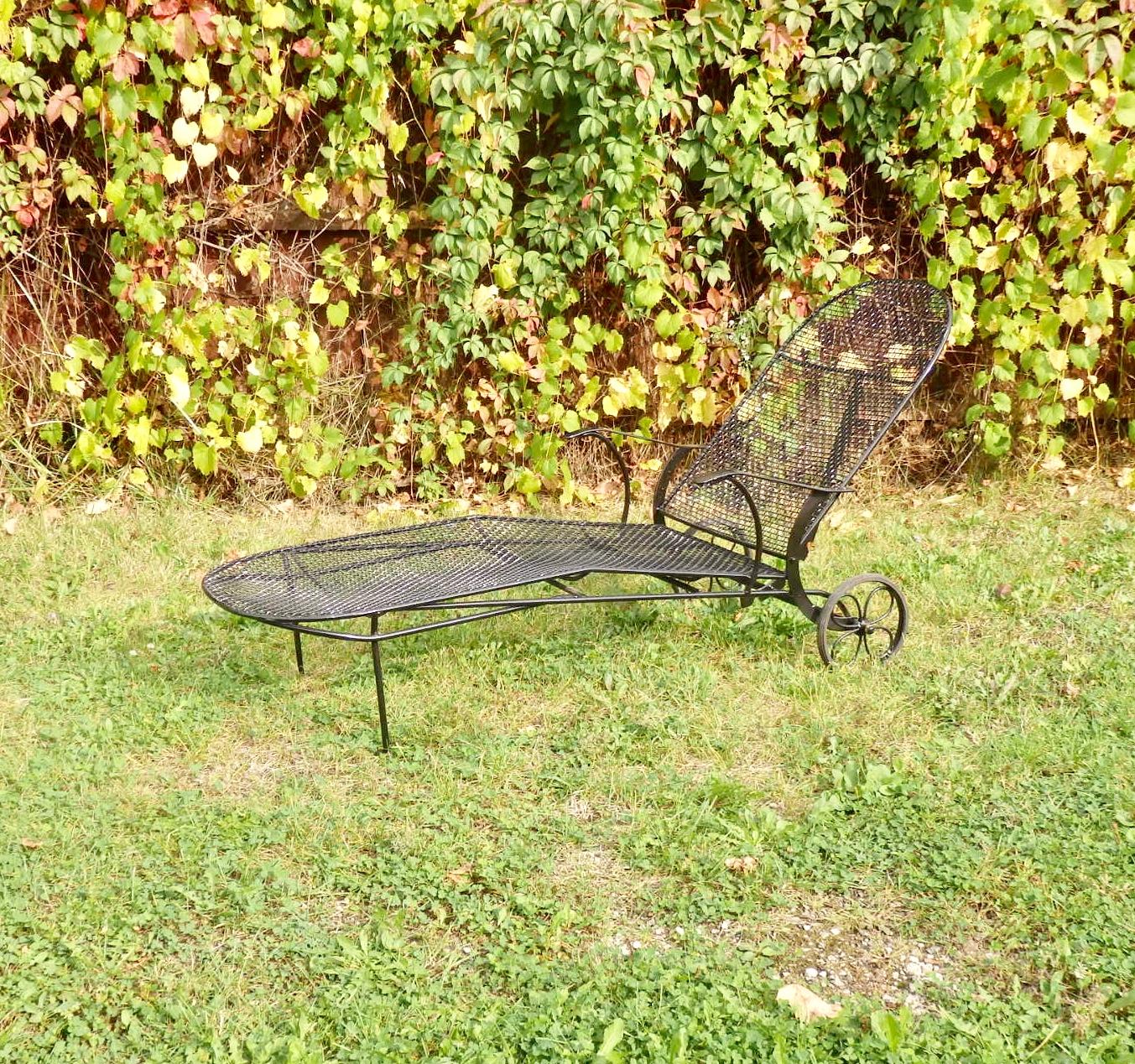 Wrought Iron with steel mesh Woodard adjustable back rolling chaise