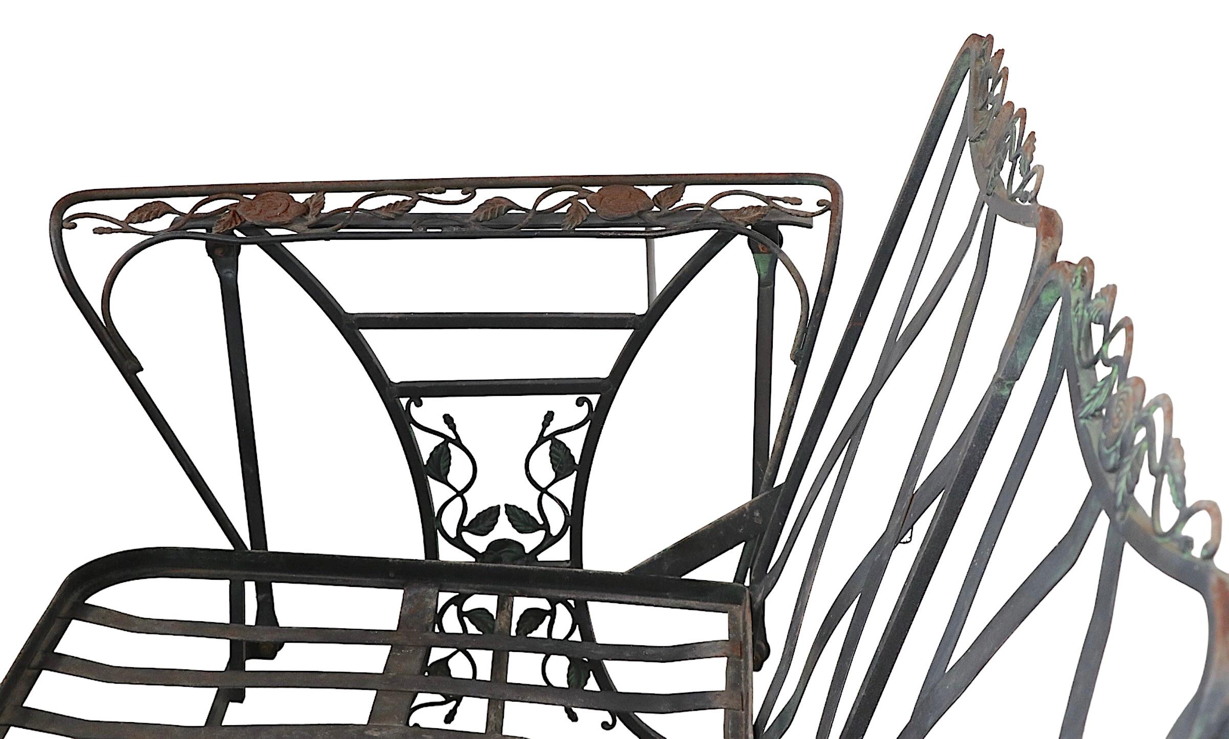 wrought iron glider bench