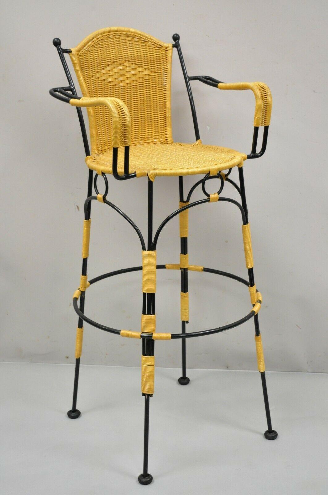 Wrought iron woven vinyl rattan spanish barstools with arms - set of 4. Listing includes (4) barstools, woven vinyl rattan wrapped frames, wrought iron construction, very nice set, quality craftsmanship, great style and form. Age: late 20th - early
