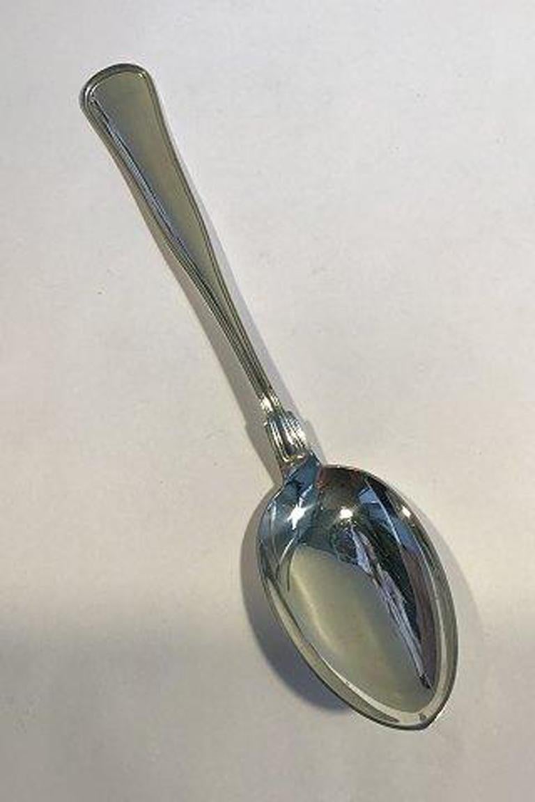 W&S Sørensen silver Dobbeltriflet old Danish dessert spoon.

Measures 17.5 cm(6 57/64 in).
 