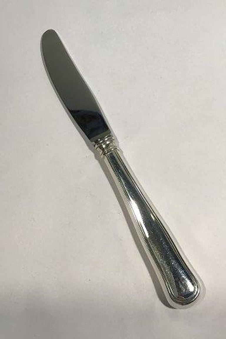 W&S Sørensen Silver Dobbeltriflet Old Danish dinner knife.

Measures 21.5 cm(8 15/32 in).
 