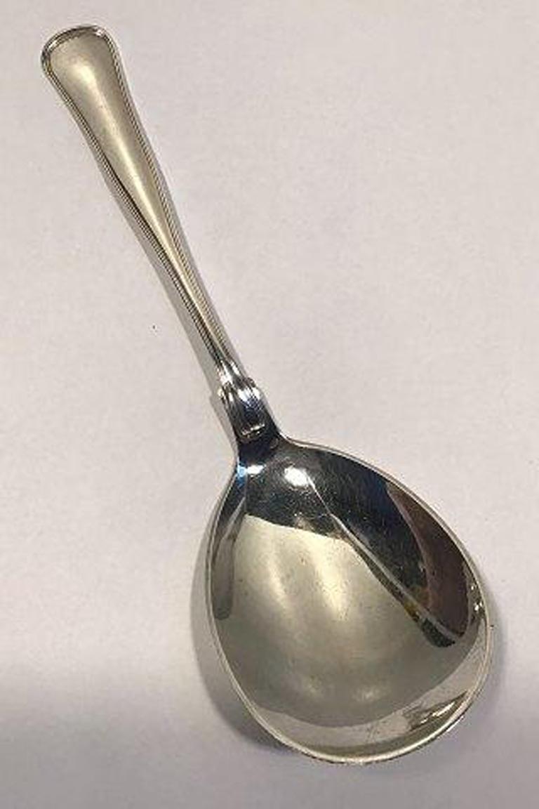 W&S Sørensen Silver Dobbeltriflet Old Danish serving spoon.

Measures 22 cm (8 21/32 in).
 