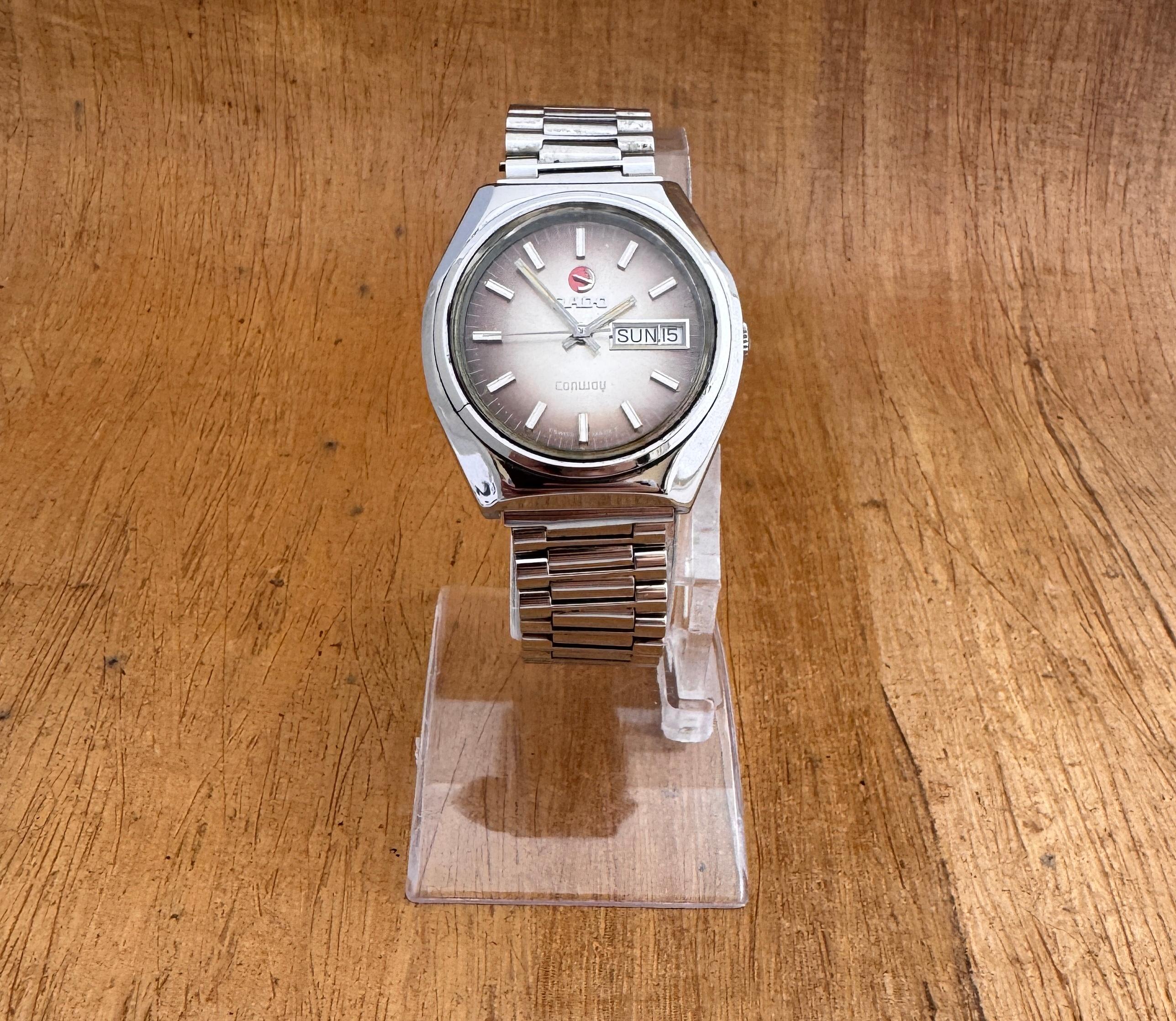  Brand : Rado

Model: CONWAY

Reference Number: 625 31594

Price: 175 USD

Country Of Manufacture: Switzerland

Movement: Automatic

Case Material: Stainless Steel

Measurements :37mm diameter (excluding crown )

Band Type : Stainless Steel With