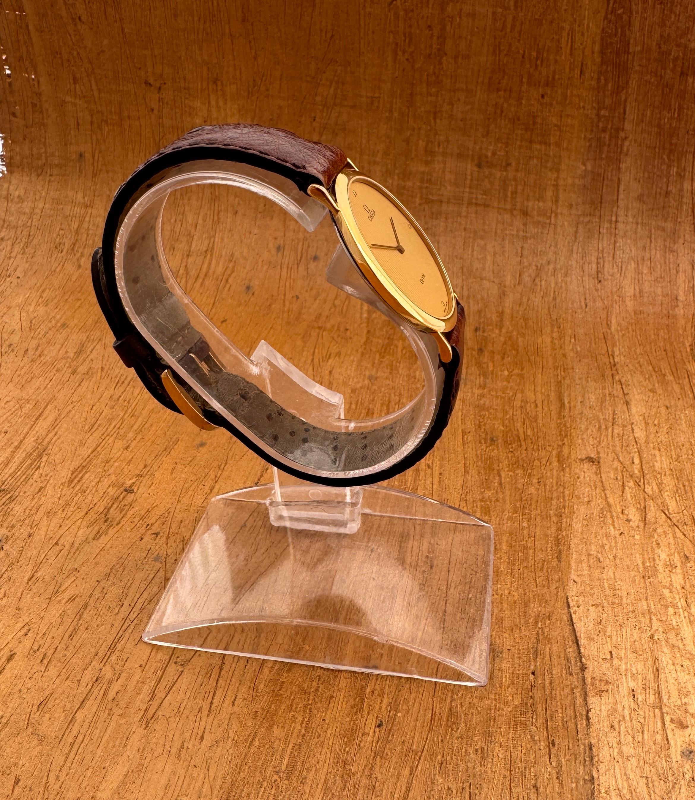  Brand: Omega

Model: De Ville

Reference Number: 1950055

Price :350 USD

Country Of Manufacture: Switzerland

Movement: Quartz cal 1378

Case Material: Gold Plated Stainless steel

Measurements : Case width: 33mm. (without crown)

Band Type :