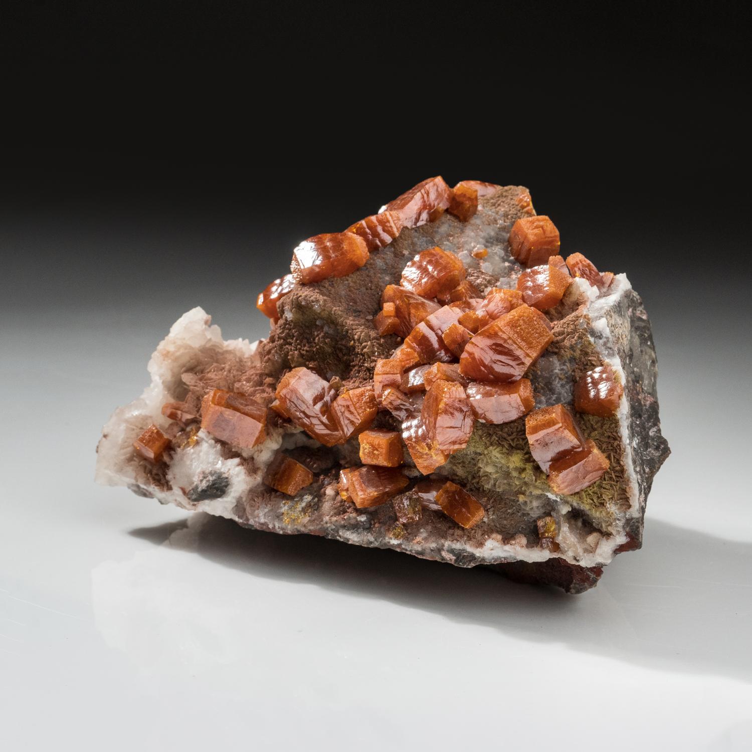 This large cluster of butterscotch Wulfinite cubic crystals on matrix was discovered in the Ahumada Mine, Sierra Los Lamentos, Chihuahua, Mexico. These rare, Wulfenite specimens have been a prize choice for collectors for many decades. These