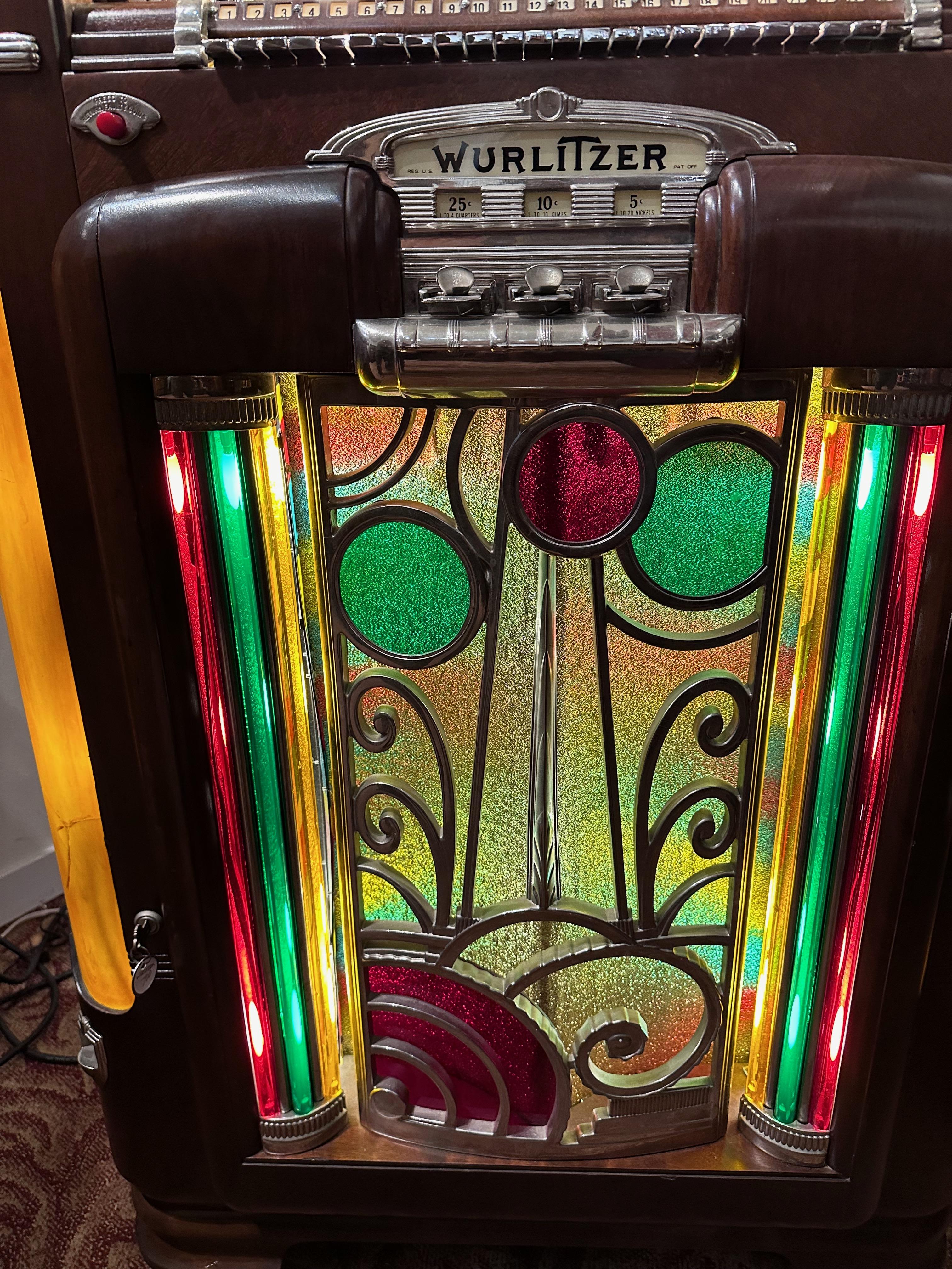 Wurlitzer 700 was a design masterpiece by Paul Fuller, its smooth art deco lines have stood the test of time, and it is a beautiful creation. This model plays 78-style records and the mechanism and sound are great. It holds 24 records in re-chromed