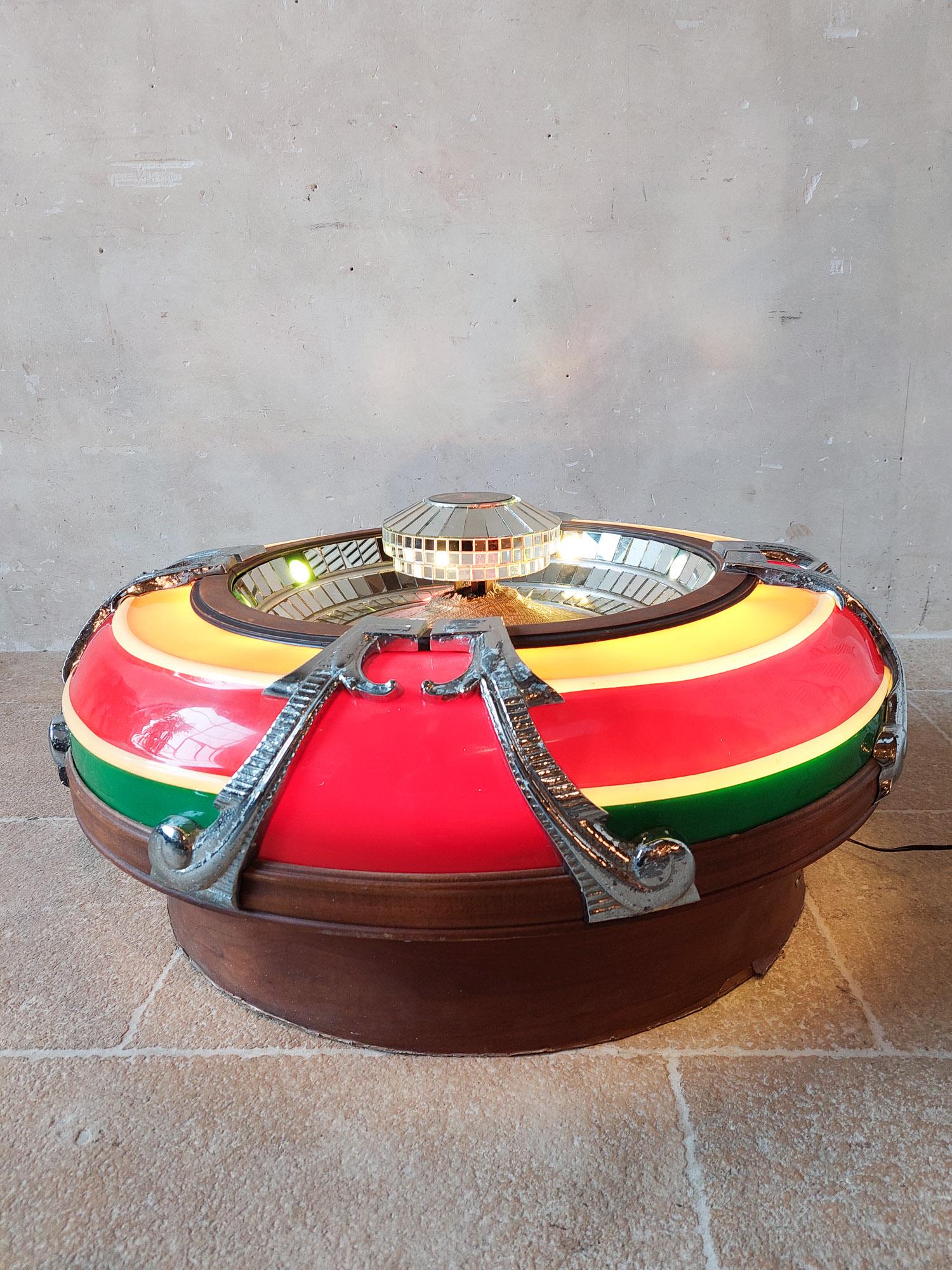Special Wurlitzer sound speaker. Wurlitzer 4008 (for your Jukebox), 20th century.

Suitable for wall and ceiling mounting. With disco coloured lighting and mirrors for a beautiful play of colours.

Diameter ± 90 cm, height ± 40 cm

The Rudolph