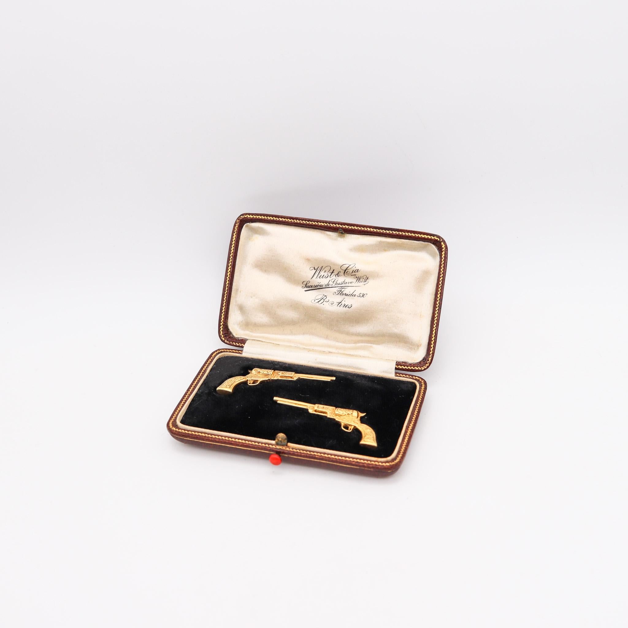 A fabulous pair of cufflinks in fitted box designed by Wust & Co.

Magnificent and very rare pair of cufflinks, created during the early art deco period, back in the 1915-20. This pair has been made in the shapes of stylized miniatures colt pistols,