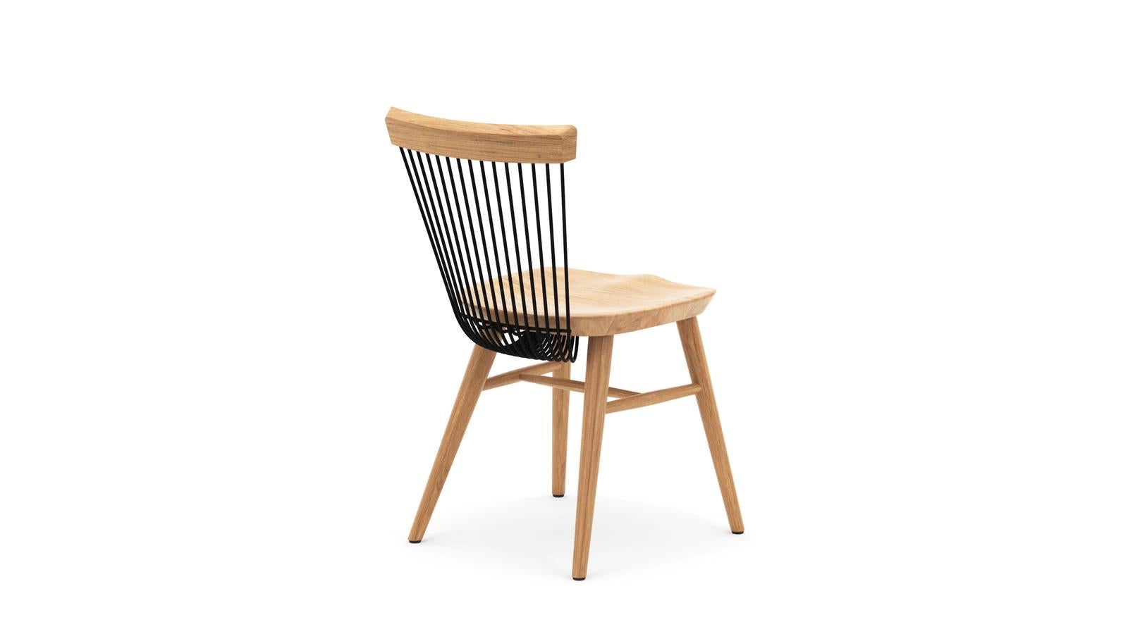 Based on a modern Windsor design, the WW Chair, where the first 'W' stands for Windsor and the second for Wire is an iconic piece of furniture. Produced from solid oak with the unique 'wire' backrest formed from mild steel rods which are delicately
