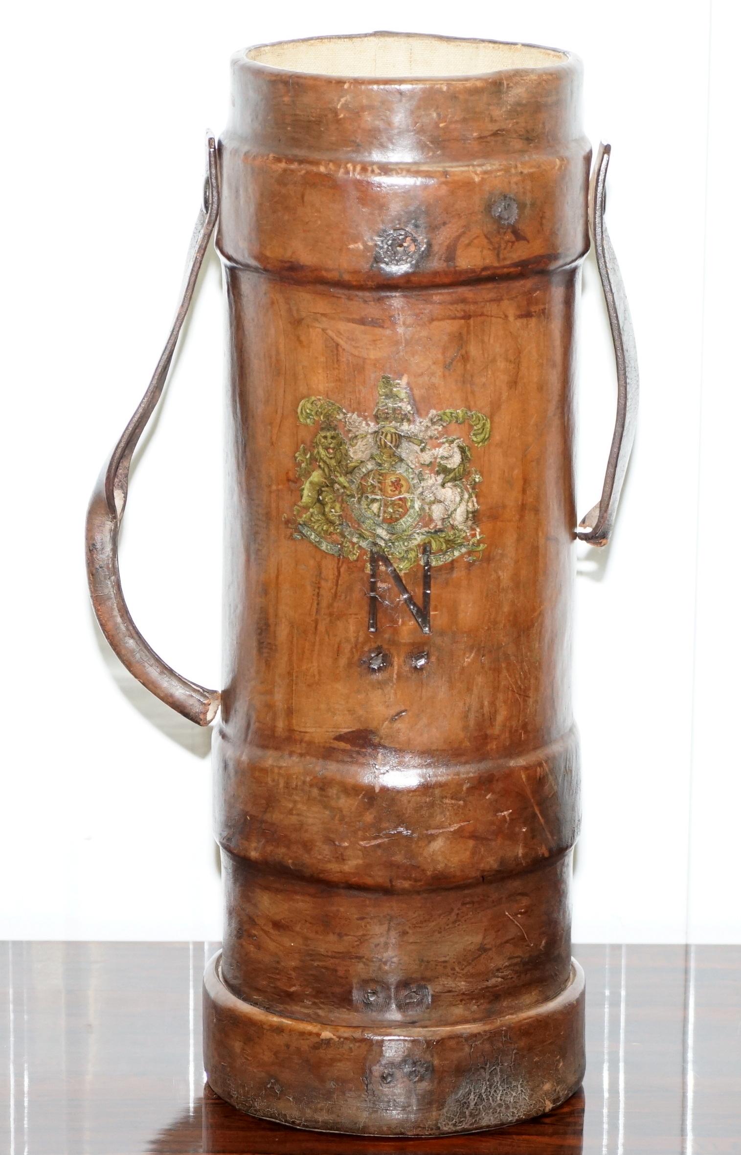 We are delighted to offer for sale this stunning and really very rare WWI British Royal Navy shot bucket fully stamped to the base NO.58 III BH & G.Ltd in leather with the Royal Armorial crest

A good looking and well made decorative piece, used