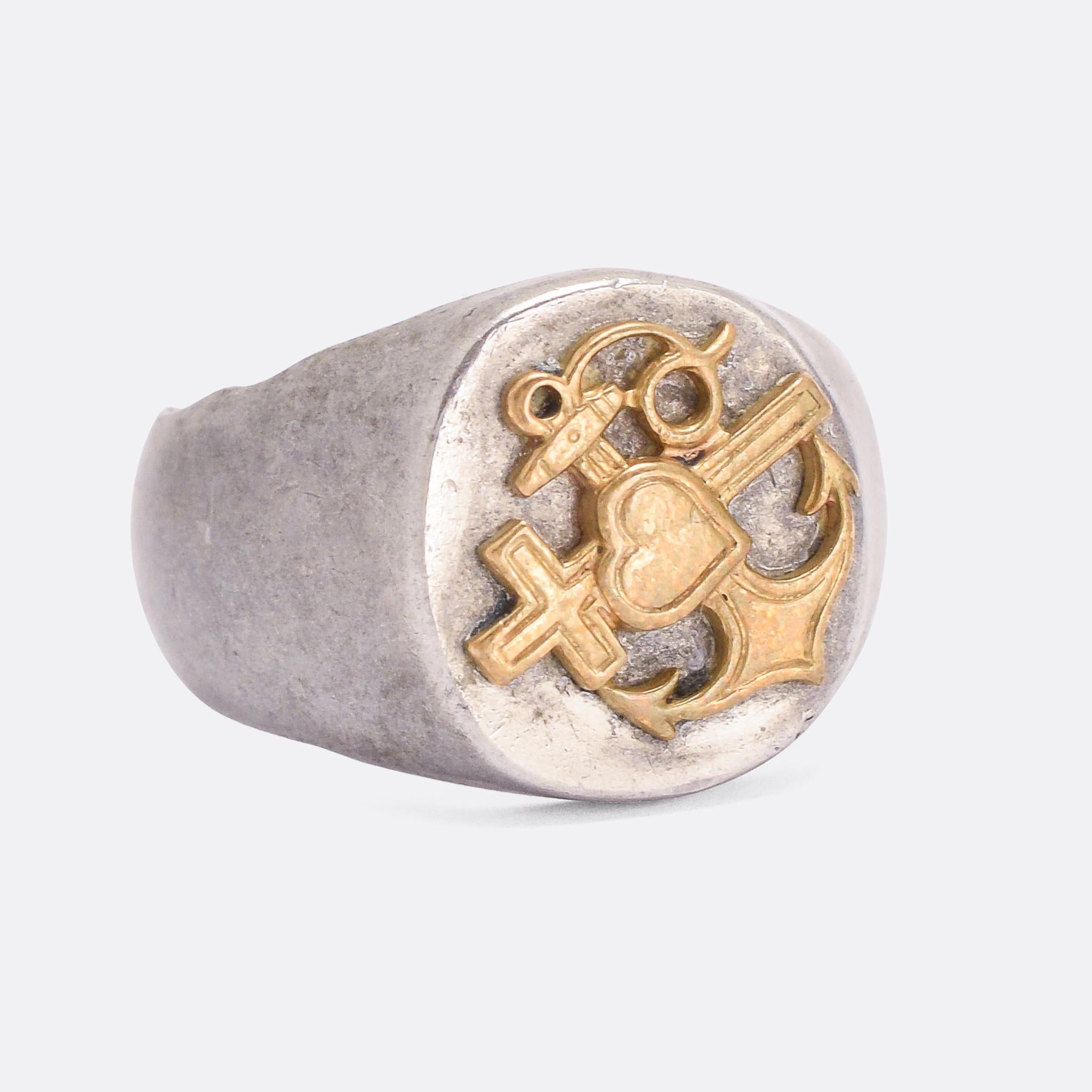 This signet ring is an unusual example of WW1 Trench Art. It's been crafted from the aluminum nose cone of a German artillery shell, with an applied Hope, Faith & Charity motif on the face (likely added once it had been sent back home). Pieces like