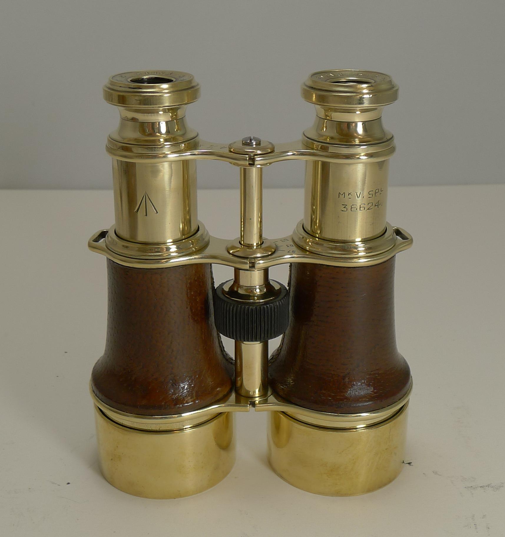 A stunning pair of French made binoculars or field glasses dating to circa 1917. Made from polished brass, they have been meticulously re-polished to gleam, which looks stunning paired with the cognac colored leather.

They focus wonderfully and