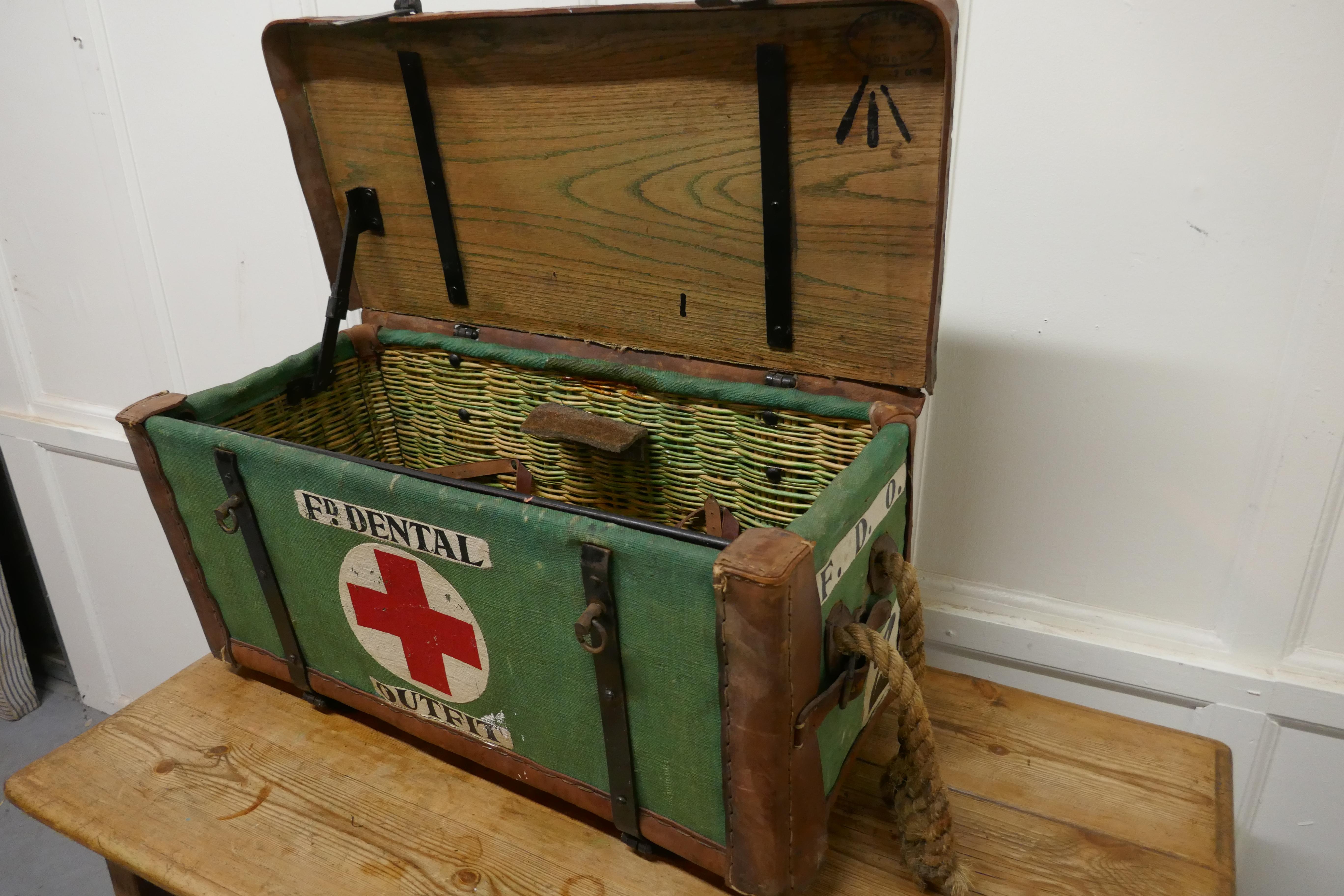 WWI vintage medical dentist outfit 

A rare piece, the outer is in strong canvas on a wicker body with a wooden lid
The case is marked with a red cross and labeled 