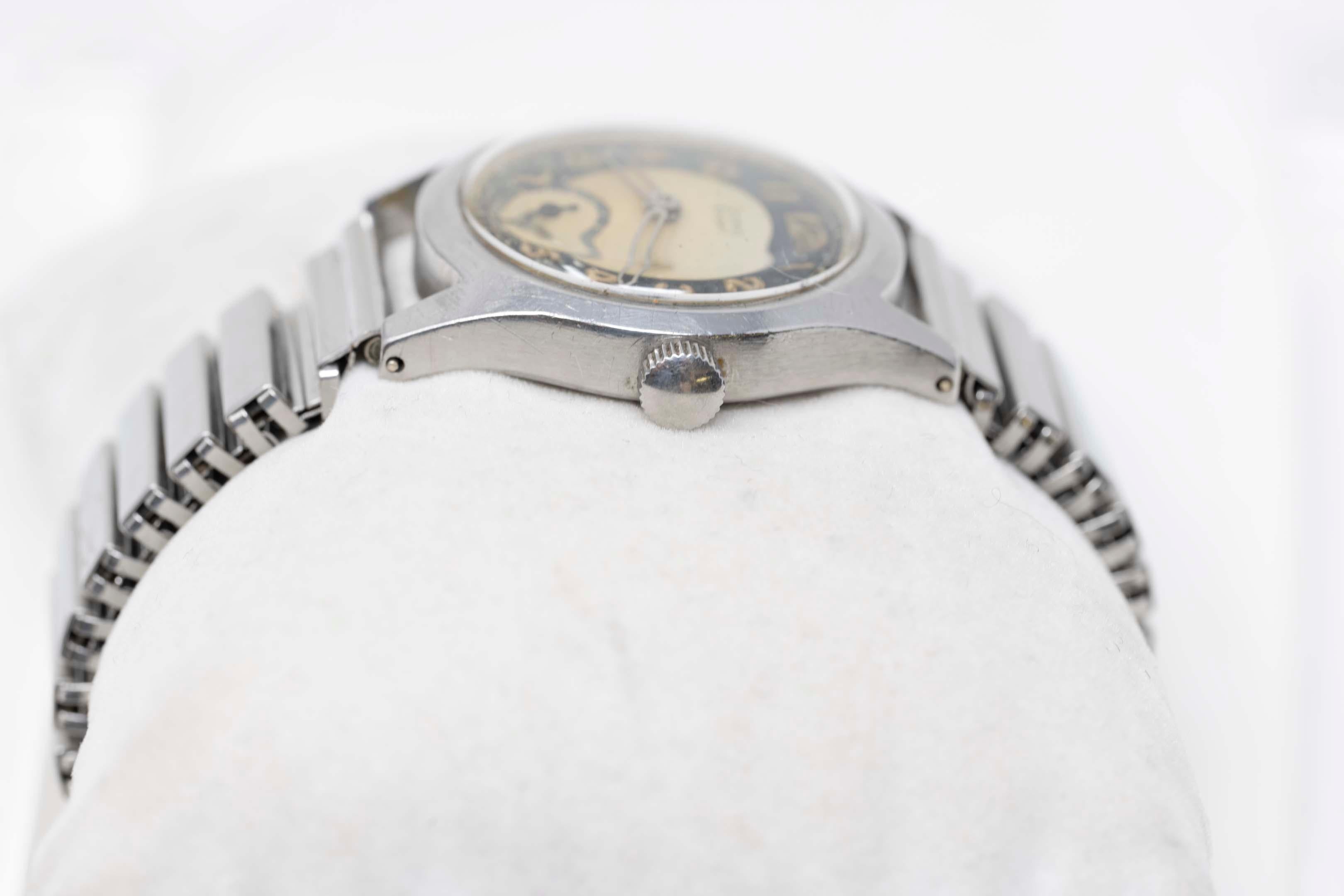 WW2 Grana Sport Uhr mit mechanischem Uhrwerk und Fixoflex-Armband aus Edelstahl. Fall misst 29mm ohne Krone, gutes Funktionieren, Genauigkeit nicht garantiert gravierte Widmung auf der Rückseite.