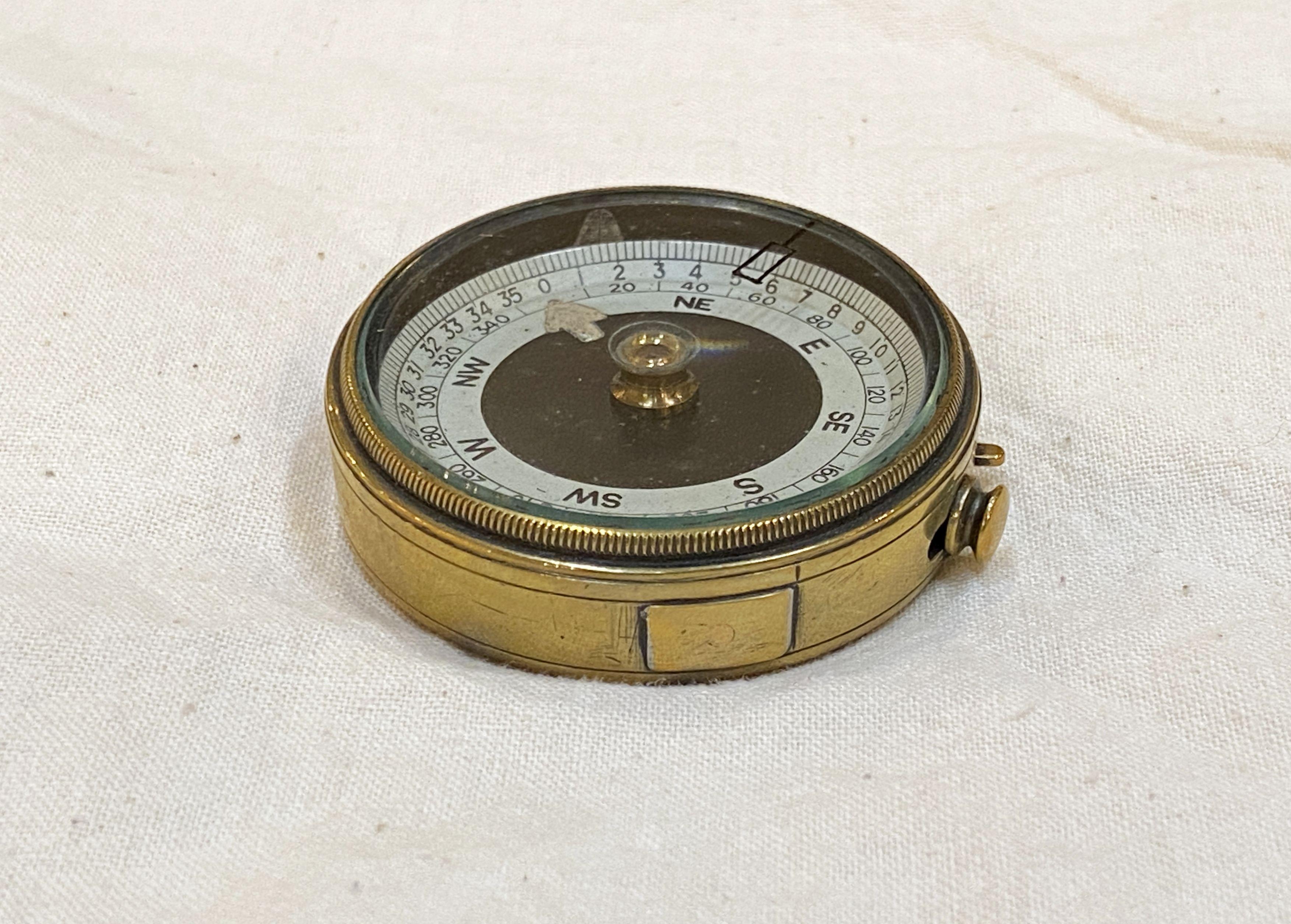 A working British marching or sighting compass of brass with original leather case from World War I - made for military and civilian use.

A handsome piece of militaria and a fine memento from the Great War. 

Note: Dimensions listed are the size of