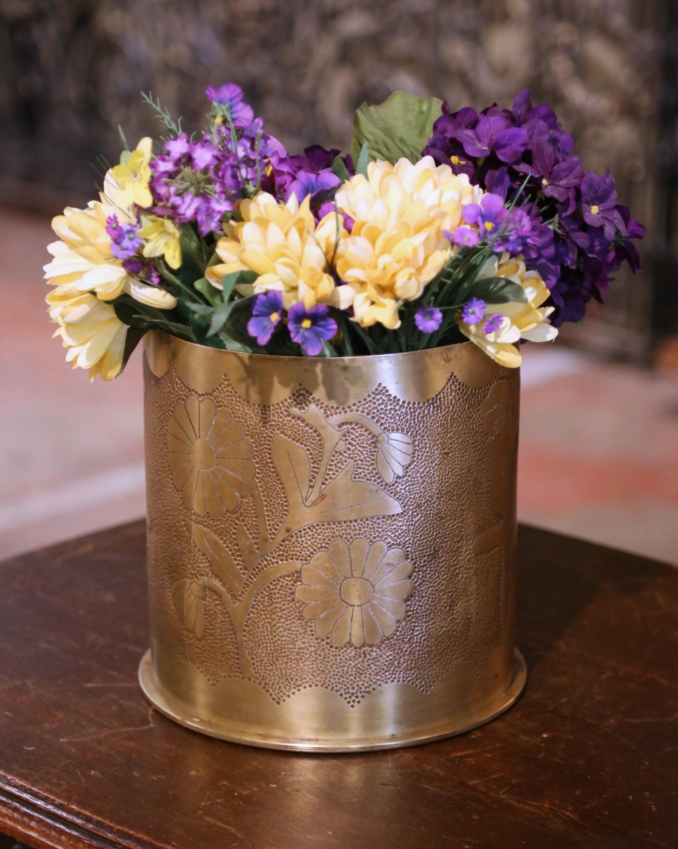 Decorate a man's office or a study display shelf with this antique trench art shell casing. Created in Germany, and dated 1918, this World War I artillery shell casing has been masterfully transformed into a decorative object. Made of solid brass,