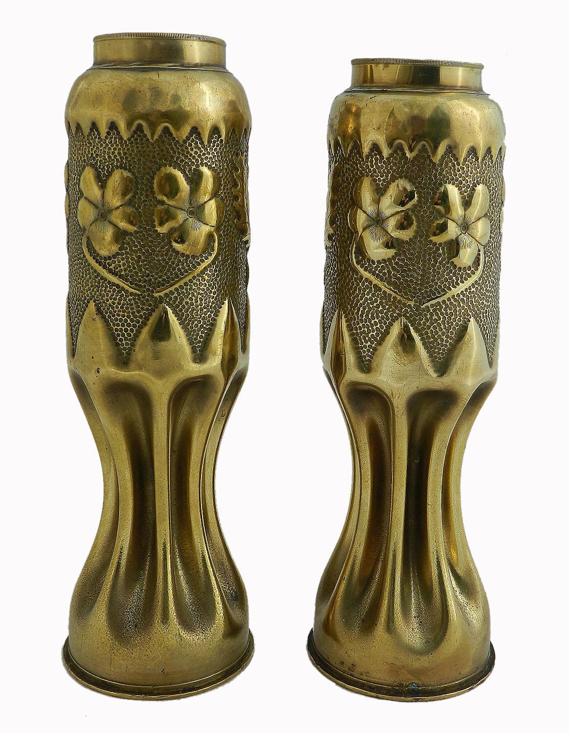 Pair of WWI Trench Art shell cases, French, 1914-1918
Brass ammunition cases modeled as vases
Mementos 
This particularly handsome pair have shields containing initials LM and CM and floral decoration
Very good condition only very minor signs of