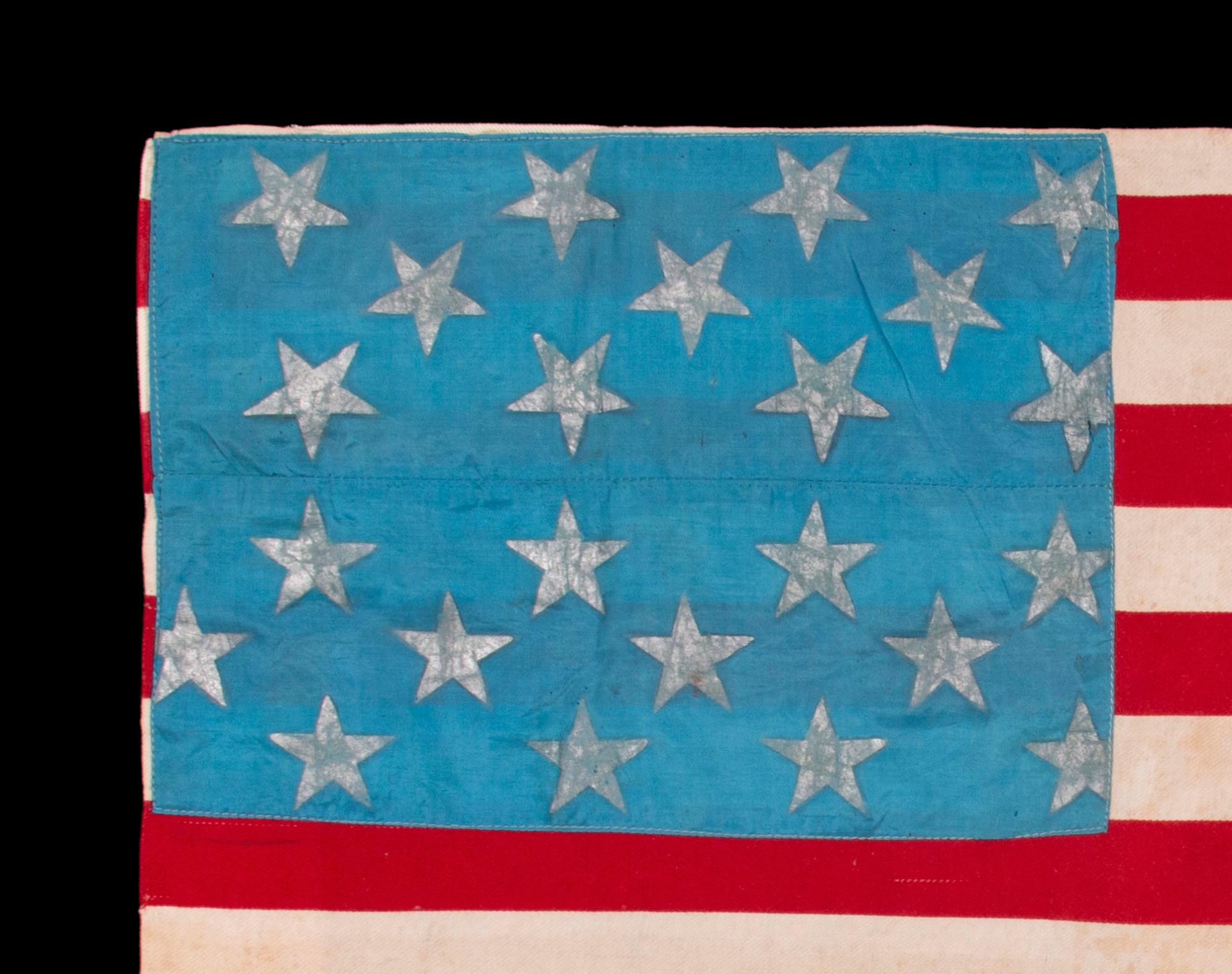 WWII LIBERATION FLAG w/ 23 SILVER GILT STARS ON A CORNFLOWER BLUE CANTON & 16 STRIPES,  MADE TO WELCOME U.S. TROOPS IN FRANCE FOLLOWING LIBERATION FROM THE GERMANS IN THE WAKE OF THE 1944 NORMANDY INVASION,  FOUND IN BRITTANY:

French-made variant