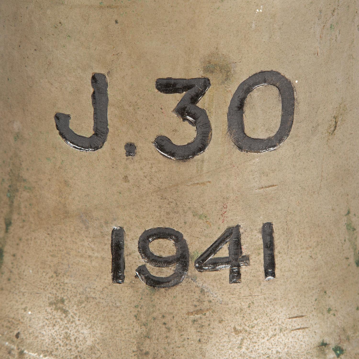 A WWII ship's bell from the Royal Navy minesweeper HMS Queen of Thanet, dated 1941.

Pendant number J-30.

Diameter: 27cm - 10 ½ inches.

Height: 28 cm - 11 inches.

 

HMS Queen of Thanet (J30), formerly HMS Melton, was a Racecourse-class