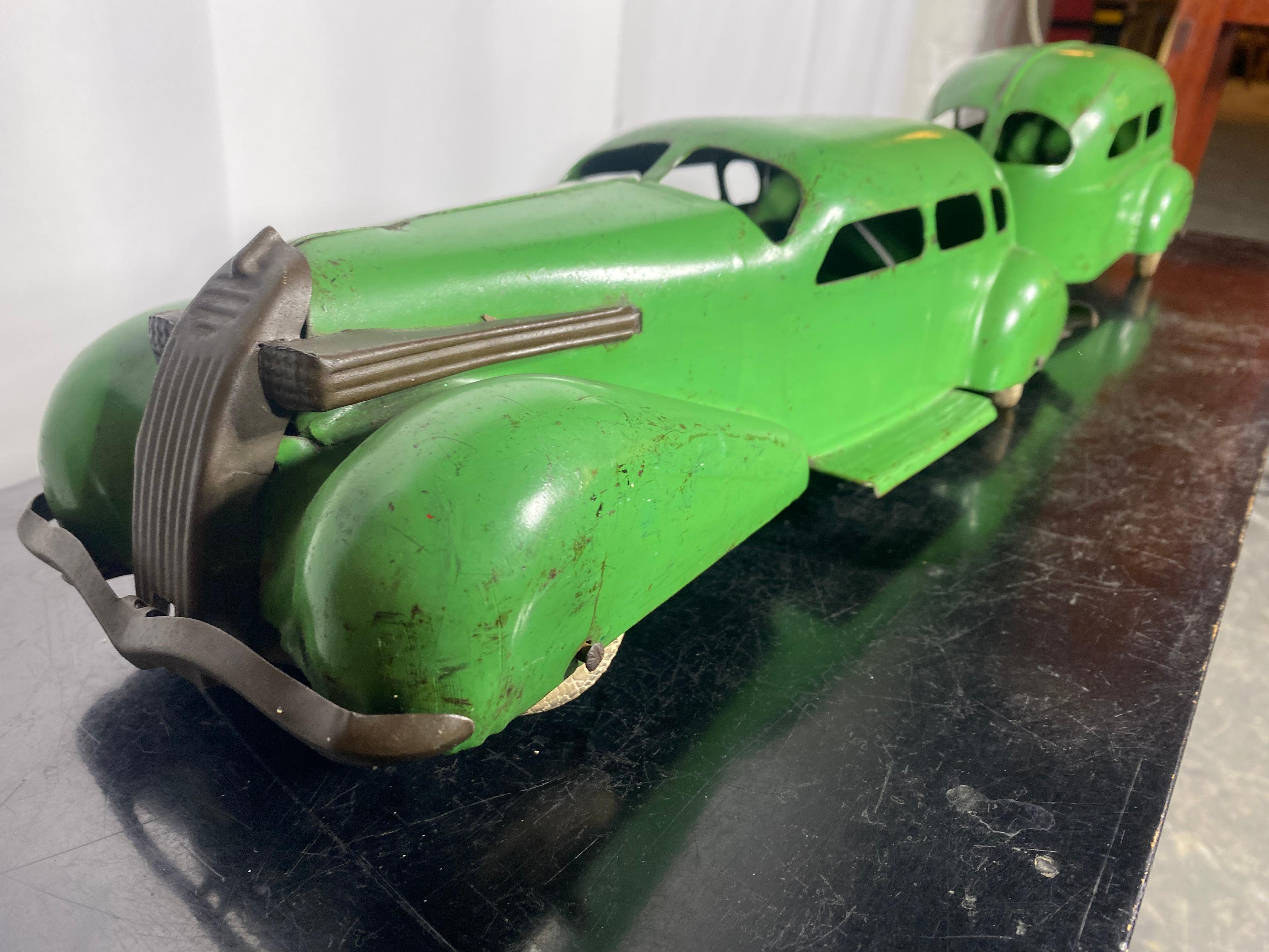 1930's Wyandotte Lasalle Touring Car and Airstream Trailer .pressed steel , Art Deco vintage toy.. Seldom seen green color,, Car and Trailer in Nice original condition,original paint  wonderful patina,,  original rubber wheels a bit flattened..