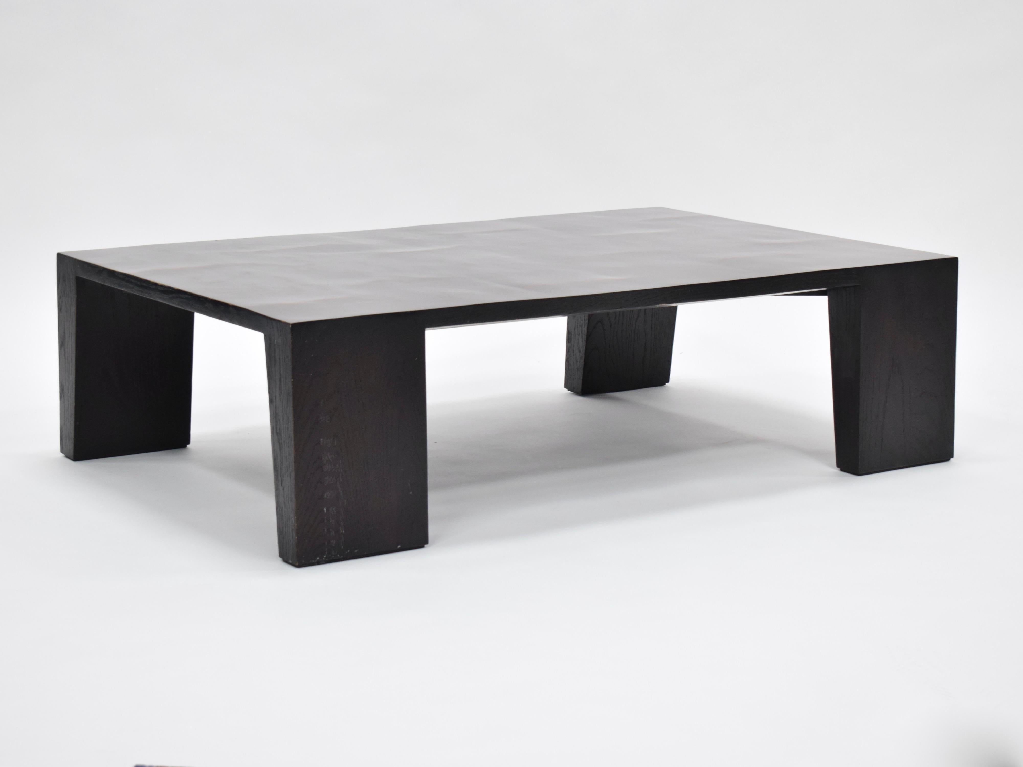 Designed by John Birch of Wyeth, this coffee table is crafted from carbonized split bamboo and textured stained oak veneers. Espresso finish. 

