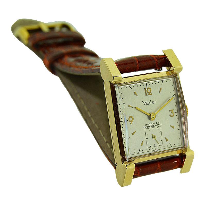 FACTORY / HOUSE: Wyler Watch Company
STYLE / REFERENCE: Art Deco / Tank Style
METAL / MATERIAL: 14Kt. Solid Yellow Gold
CIRCA / YEAR: 1950's
DIMENSIONS: 35mm X 21mm
MOVEMENT / CALIBER: Manual Winding / 17 Jewels 
DIAL / HANDS: Silvered Original with