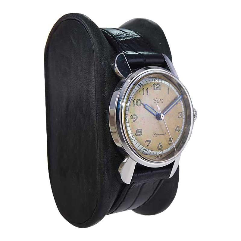 FACTORY / HOUSE: Wyler Watch Company
STYLE / REFERENCE: Art Deco / Reference 31952
METAL / MATERIAL: Stainless Steel
CIRCA / YEAR: 1950's
DIMENSIONS / SIZE: Length 40mm X Diameter 31mm
MOVEMENT / CALIBER: Automatic Winding / 17 Jewels / Shock