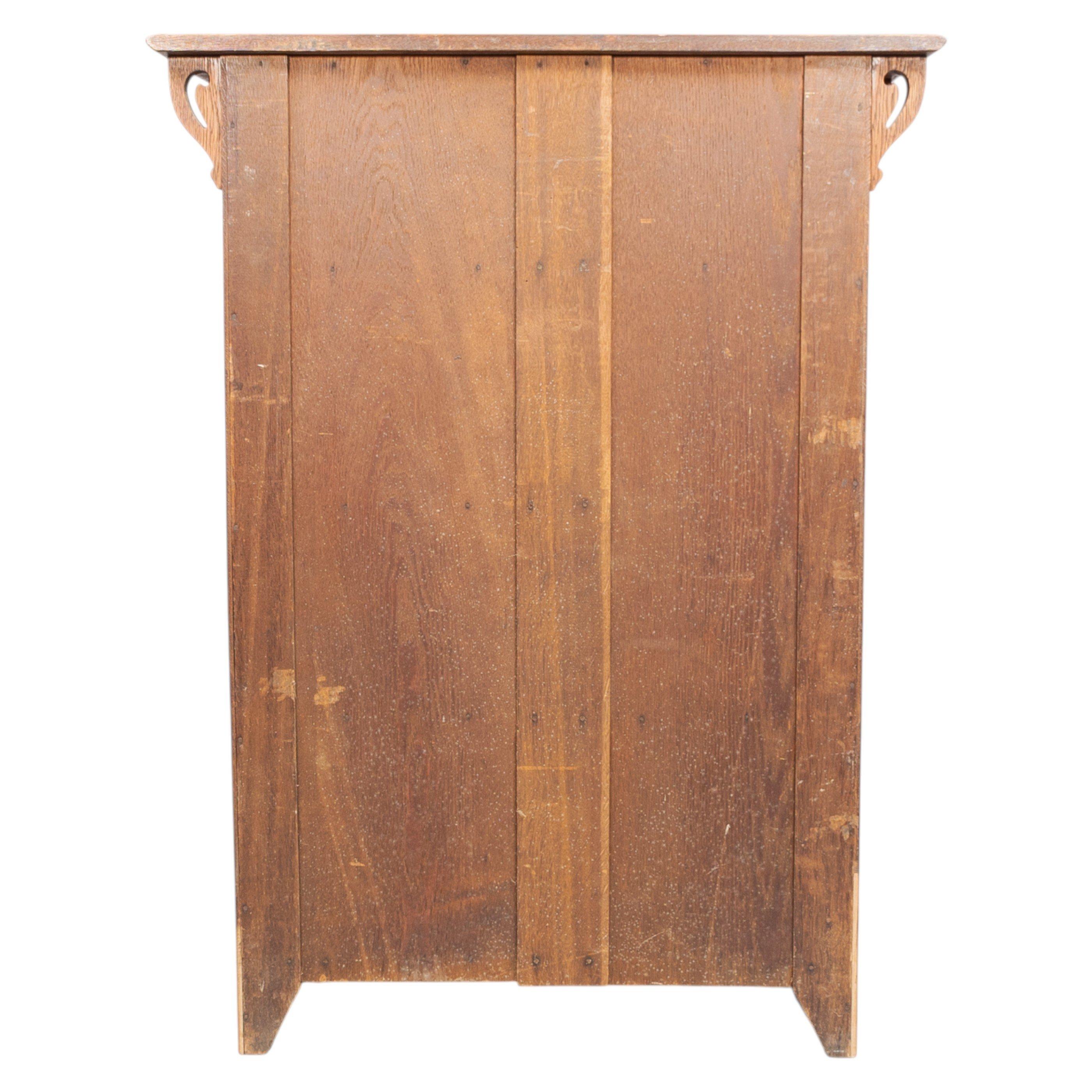 Wylie and Lochhead, in the style of. Arts and Crafts oak bookcase with cupboard For Sale 6