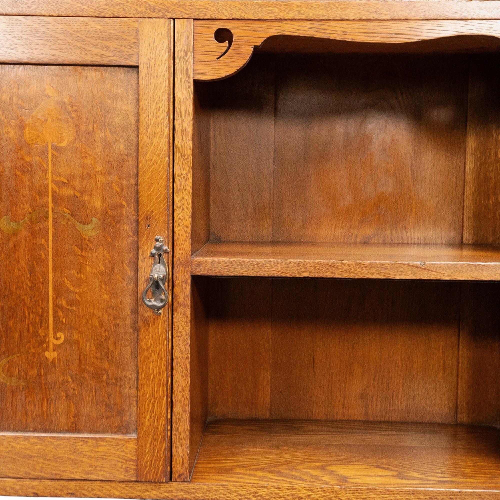 Wylie and Lochhead, in the style of. Arts and Crafts oak bookcase with cupboard For Sale 11