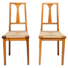 Wylie & Lochhead. Pareja de sillas auxiliares Arts & Crafts de roble