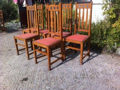 Wylie & Lochhead, Set of Six Arts & Crafts Oak Dining Chairs with Pewter Inlays