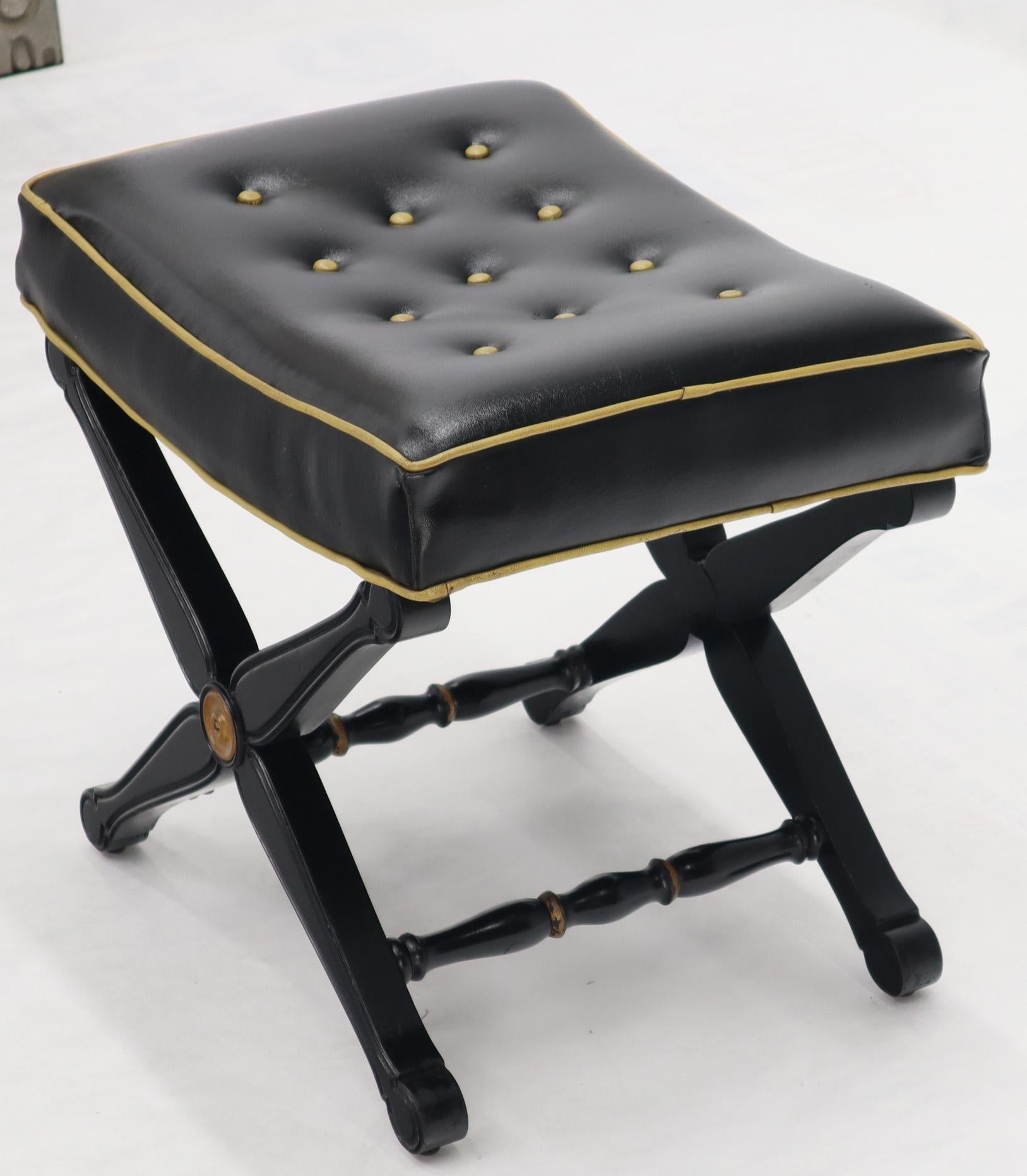 Vintage tufted upholstery black lacquer X base ottoman.