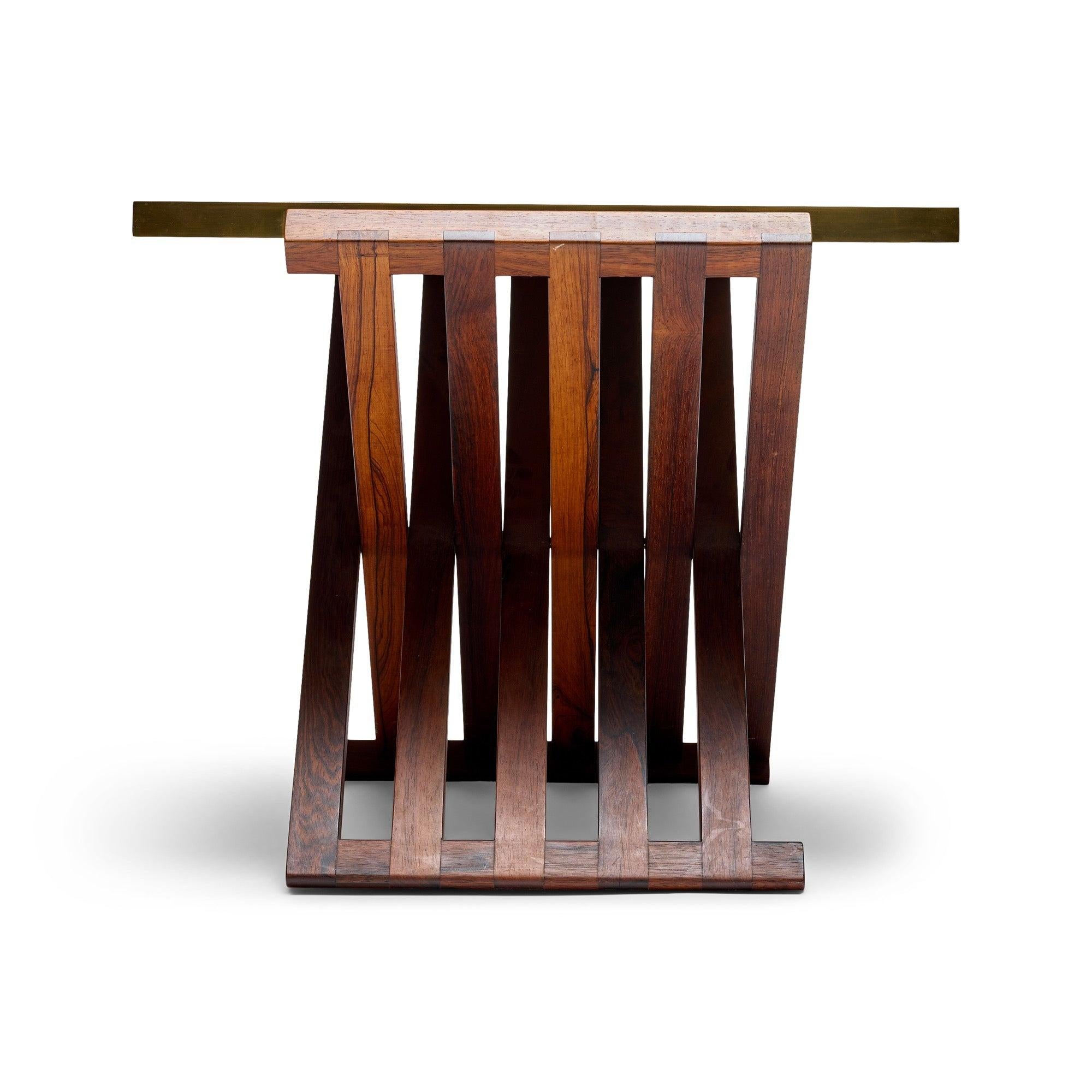 Inspired by tables of Ancient Greece this Edward Wormley design is a classic.  It is comprised of Murano glass tile, set in a brass frame top, which is removable.  It rests on a folding 