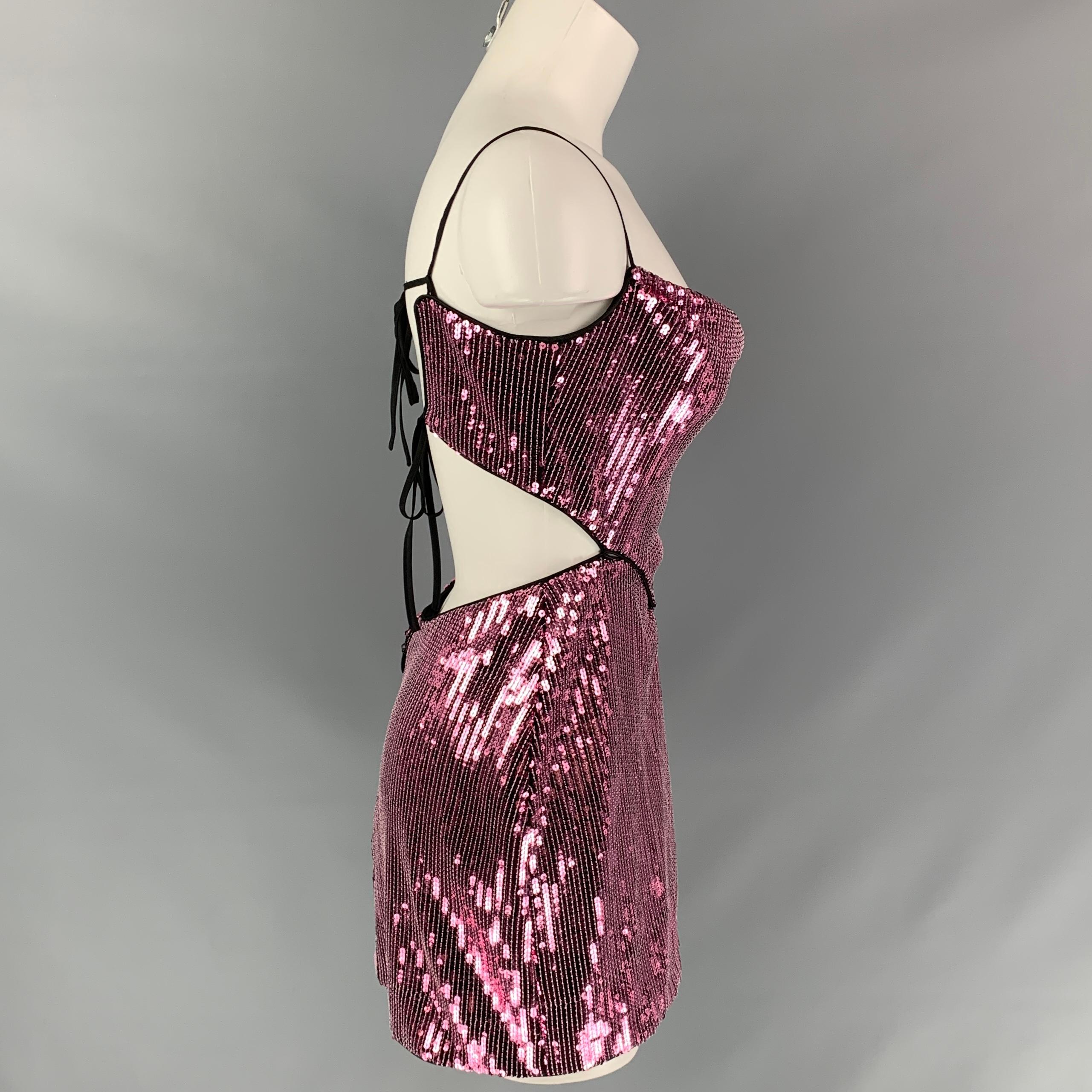 X by NBD dress comes in a pink polyester / silk with a slip liner featuring a mini style, side cut out details, back zipper, and a double back strap closure. 

Very Good Pre-Owned Condition.
Marked: XS

Measurements:

Bust: 30 in.
Waist: 28 in.
Hip: