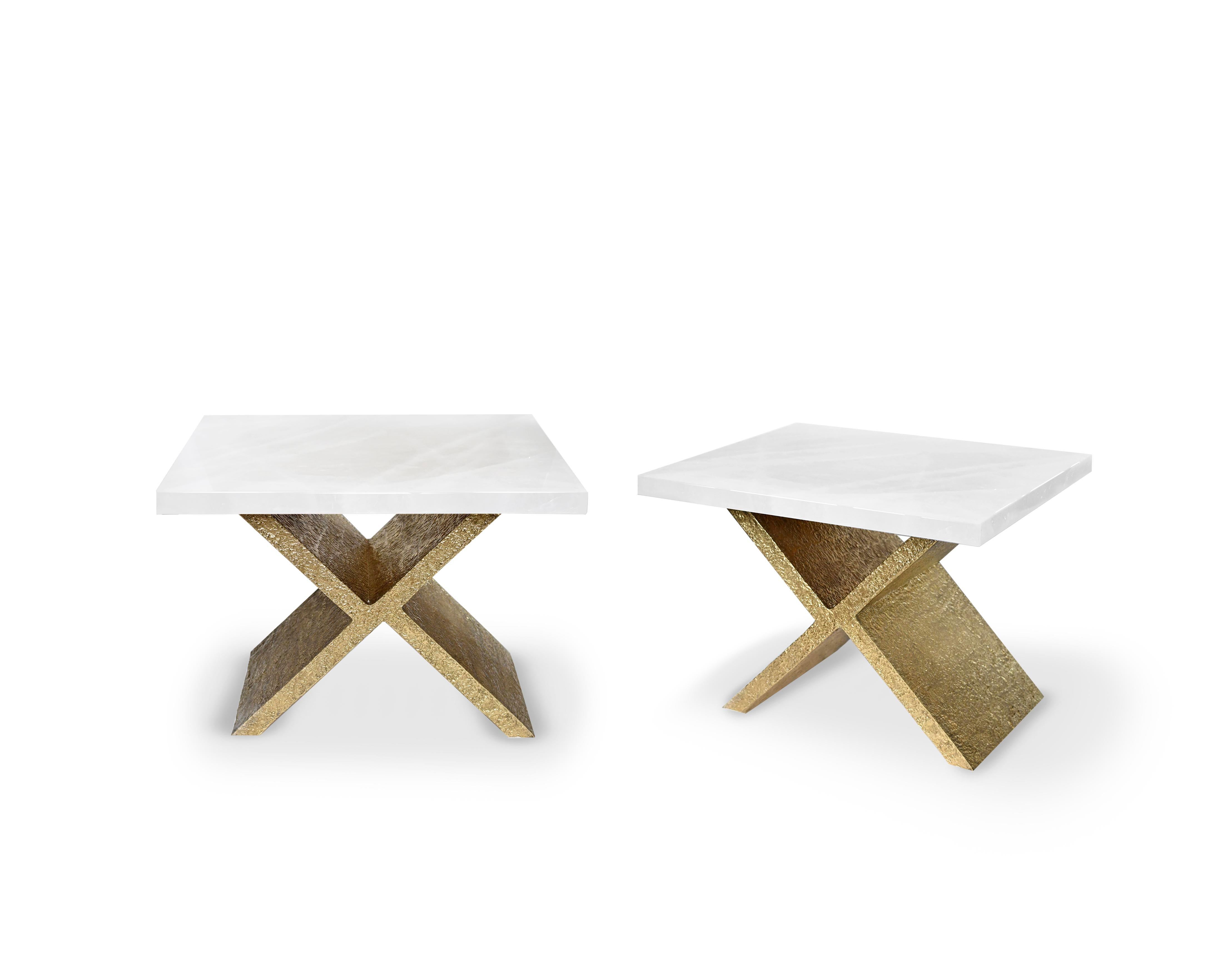 Pair of X-coffee tables, hammered details X-brass bases with rock crystal tops. Created by Phoenix Gallery.
 