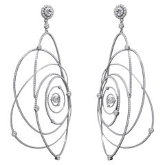 X Cosmic Orbit Diamond Earrings one of one collection