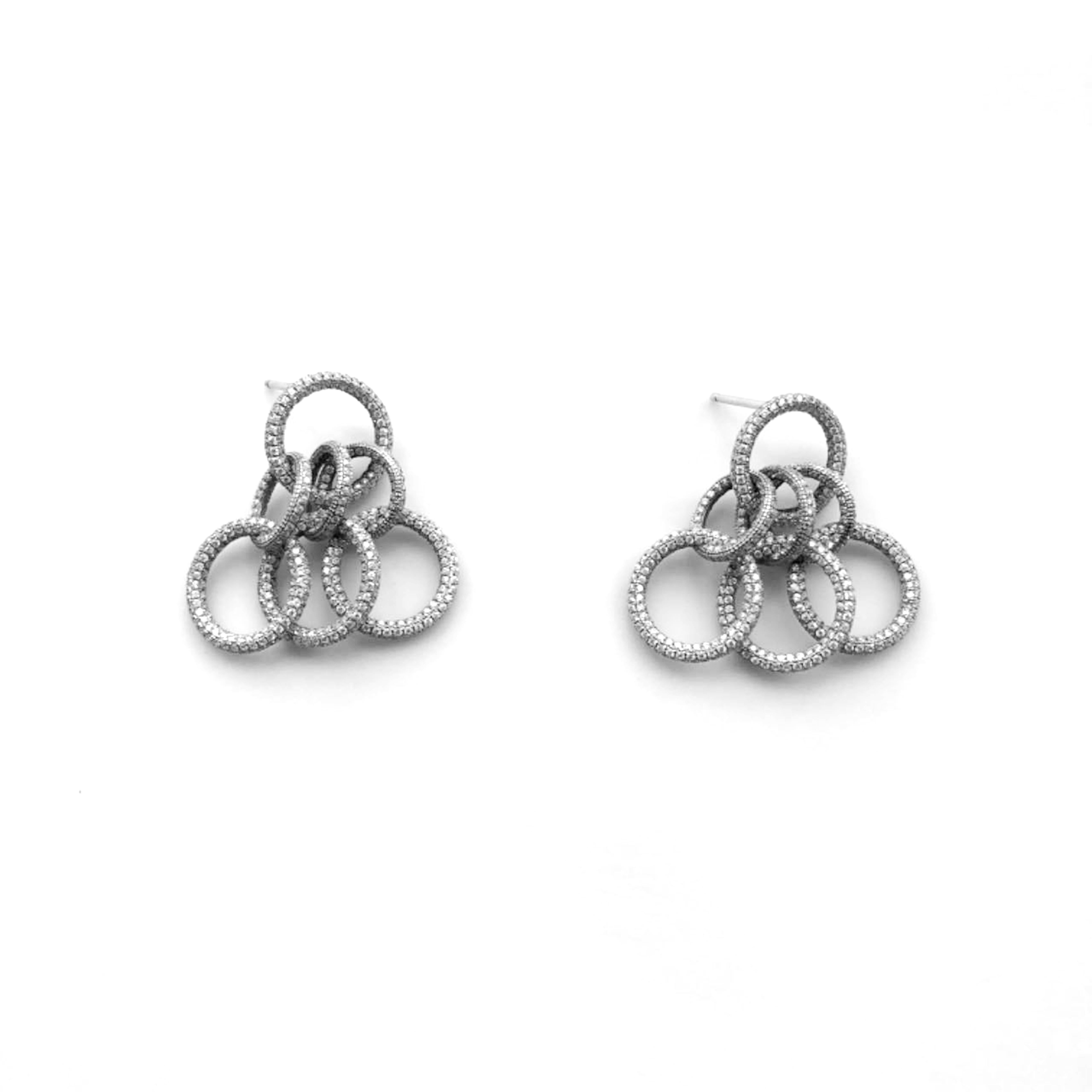 Traditional diamonds meet contemporary style .

X Cosmos. 
The balance between light and shadow , motion and solemn.

Made of 5.87crt D color diamonds with 18K white gold , with our top craftmanship AtelierX present your ideal earring collection for